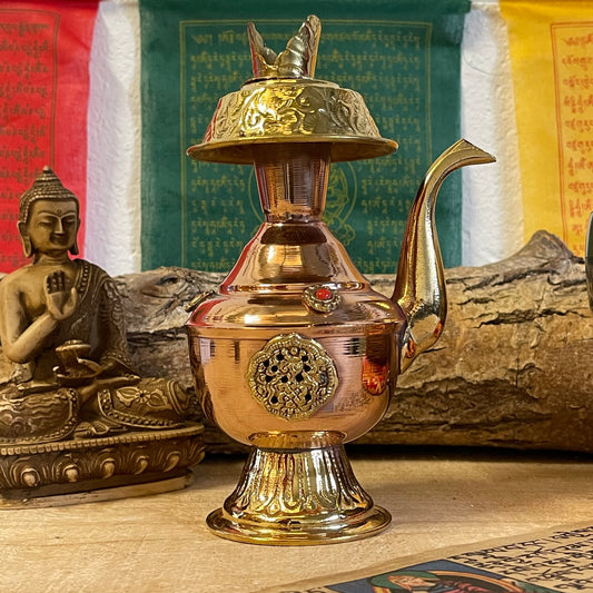 The Bhumpa, or Ritual Vase, is an important ceremonial item used for holding holy water that has been blessed by the Guru. The holy water is believed to remove negativity and to chase away evil spirits, and it is sprinkled or poured to purify persons, places or objects. Bhumpas are widely used by Gurus in many types of ceremonies, from elaborate purification rituals&nbsp;for new houses, monuments and holy sites, to simple blessings for disciples meant to purify and protect them from harmful&nbsp;forces. Bhu