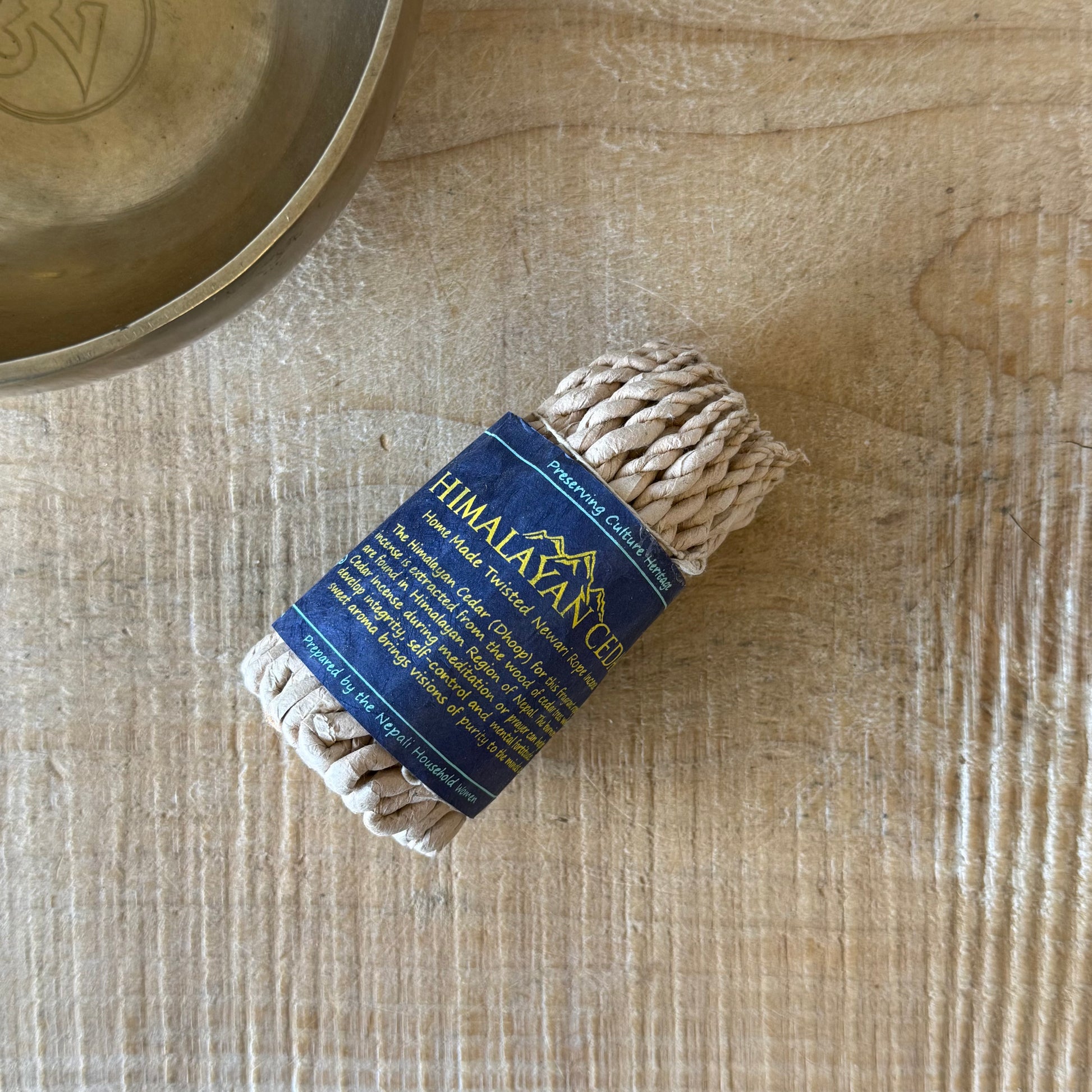 Experience the rich, woody aroma of Pure Herbs Cedar Rope Incense, a traditional Nepali incense handcrafted in the Himalayan region of Nepal. Known locally as Dhup or Newa Dhup, this distinctive rope incense has a long association with Newar culture, where it is traditionally burned in homes, stupas and temples.