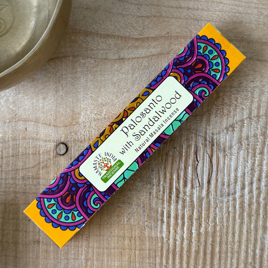 Shop Namaste India Palo Santo with Sandalwood incense sticks. Cleansing masala incense for meditation, relaxation, yoga, and mindful living.