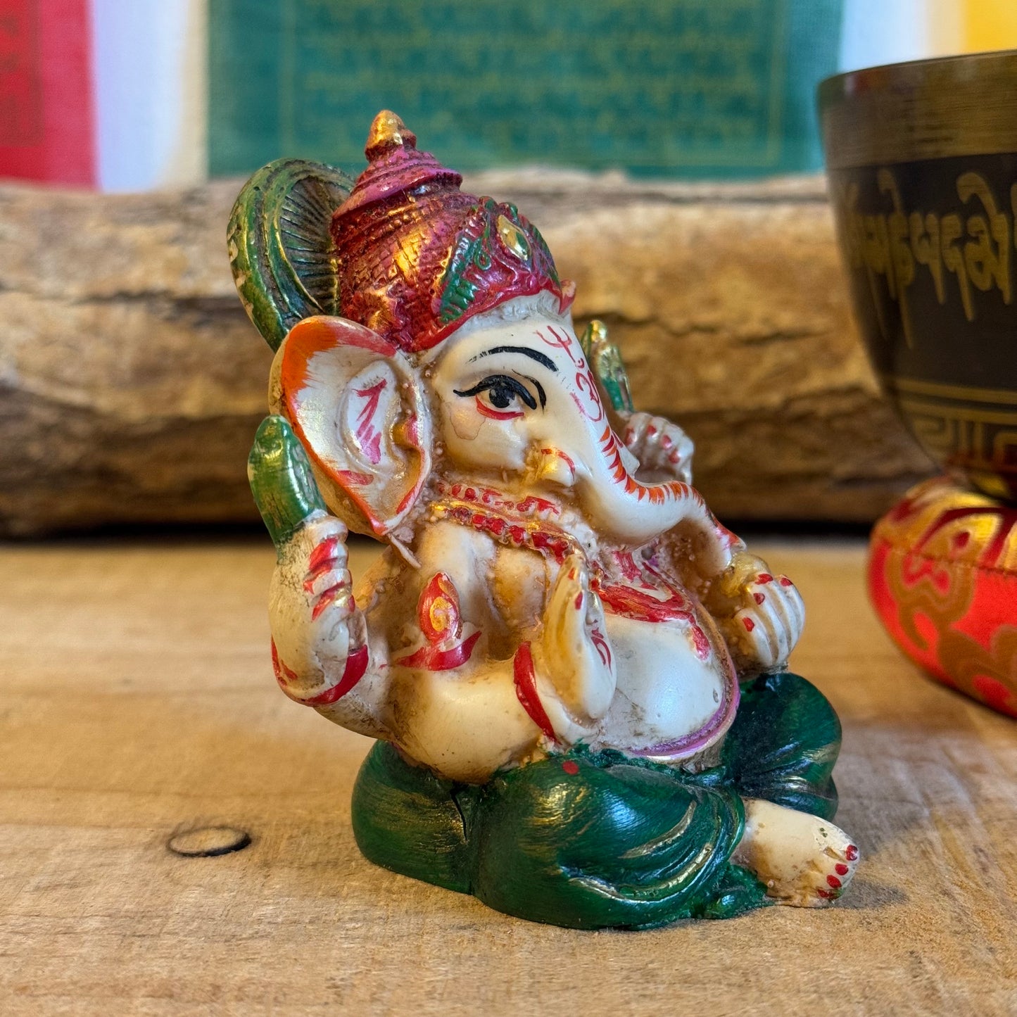 These hand-painted resin figurines depict the elephant headed deity Ganesh. A very popular Hindu god, he is known as the remover of obstacles, deva of intellect and wisdom and as the patron of the Arts and Sciences.