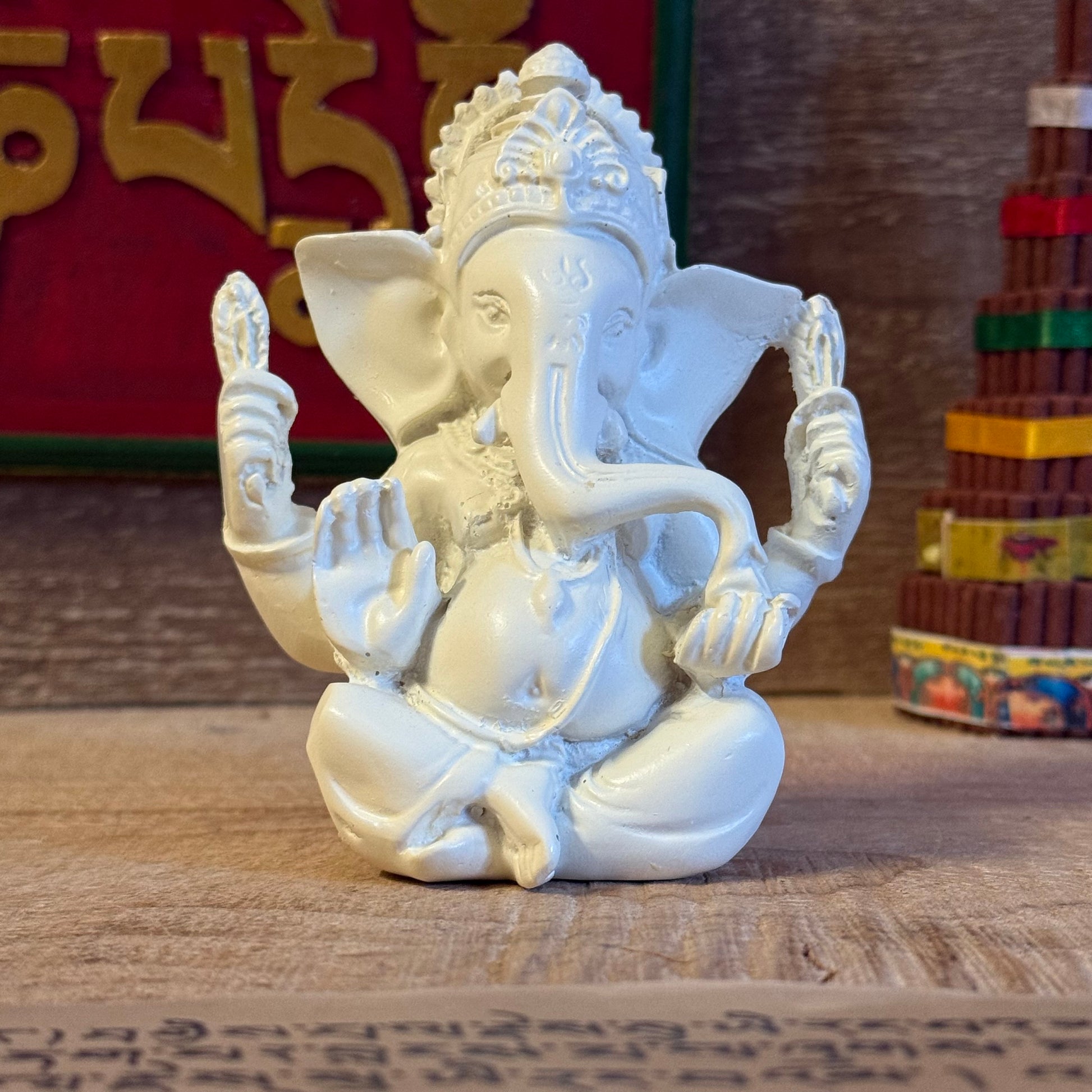 Invite blessings and good fortune into your home with this beautiful statue of Lord Ganesh, the revered elephant-headed god of wisdom, success, and prosperity. Handcrafted from durable poly resin and standing approximately 11cm tall, this piece captures Ganesh’s serene expression and four symbolic arms, each representing divine power and protection.