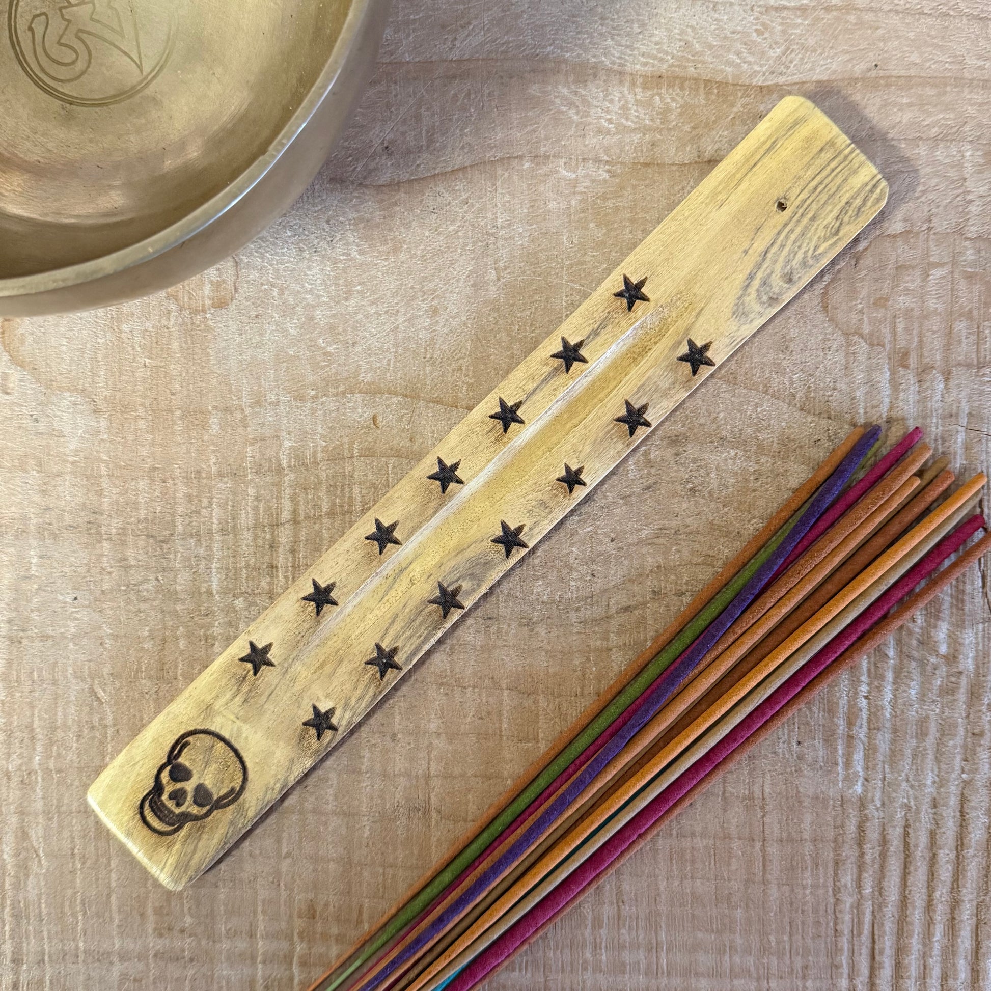 Natural mango wood incense stick holder with hand carved Skull design 26cm