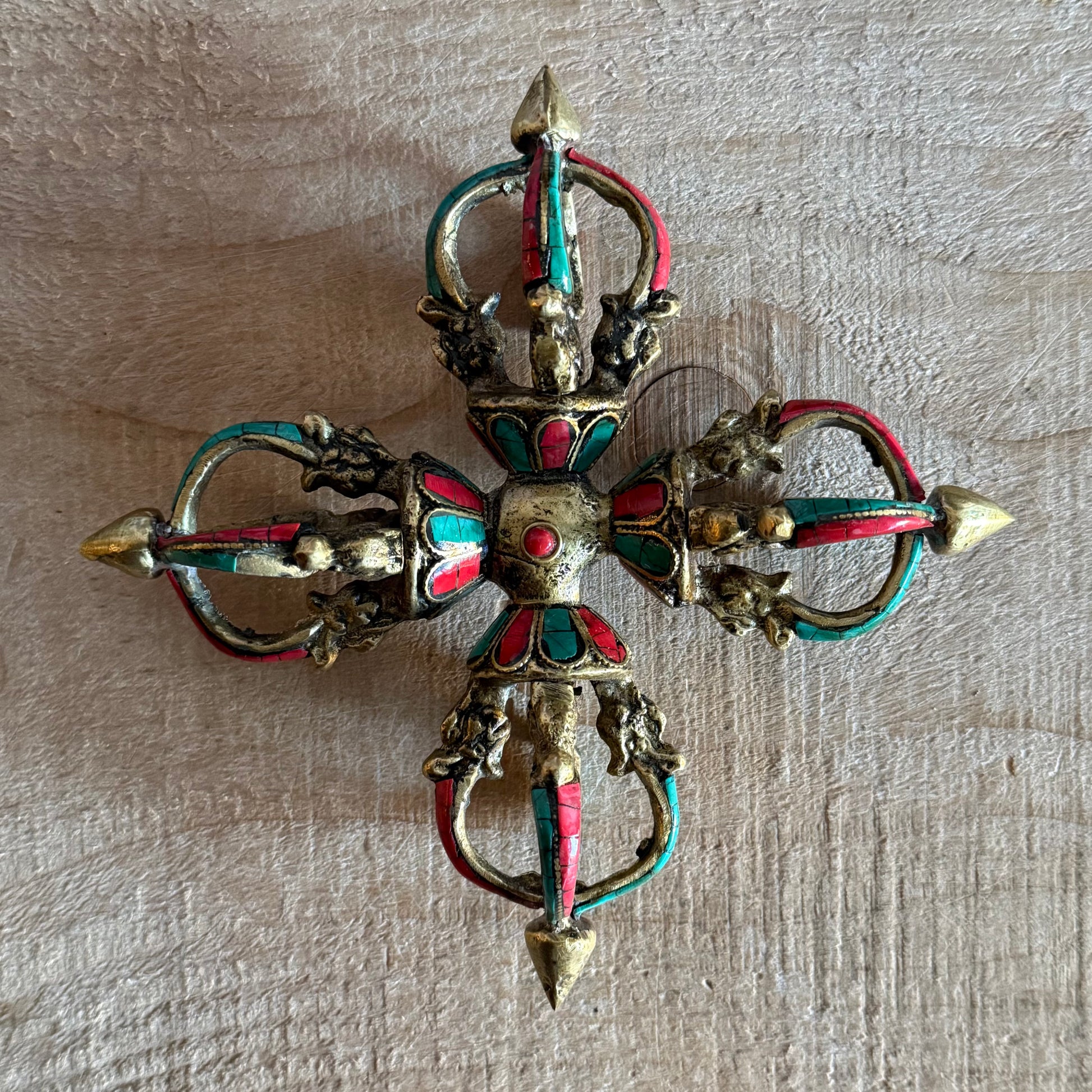 Handmade Flower Double Dorje vajra in solid brass with turquoise inlay. A powerful Tibetan Buddhist ritual object for altar and meditation use.