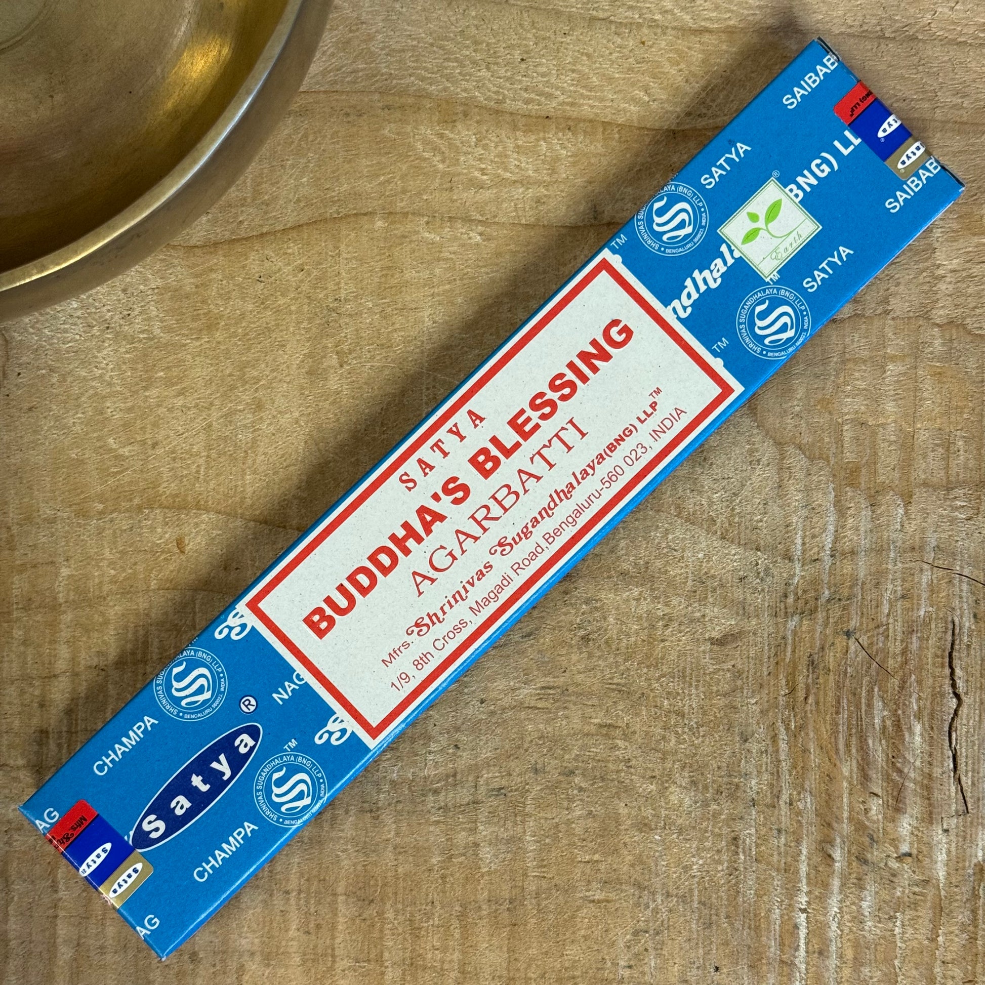 Satya Buddha Blessings Incense is a sacred offering from the renowned Shrinivas Sugandhalaya family—the same makers behind the world-famous Nag Champa line. Rooted in a traditional sandalwood base, this incense blend is enhanced with floral oils that evoke serenity, devotion, and clarity of heart.