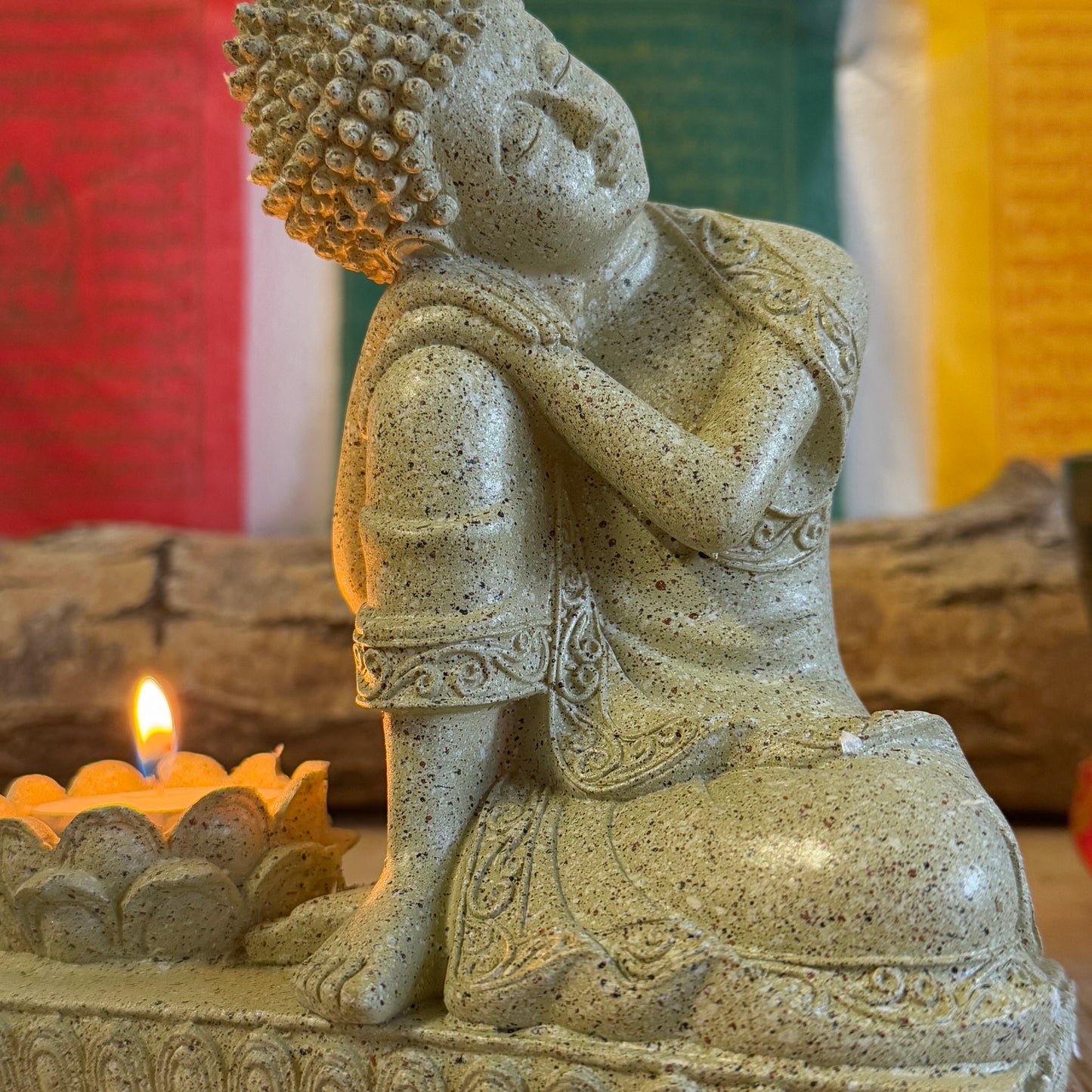 Elevate your space with this beautifully crafted Serene Relaxing Buddha Statue, perfect for creating a calming ambiance. Made from high-quality resin, the statue showcases intricate details, from the gentle expression of the Buddha to the delicately designed lotus flower that serves as a candle holder.