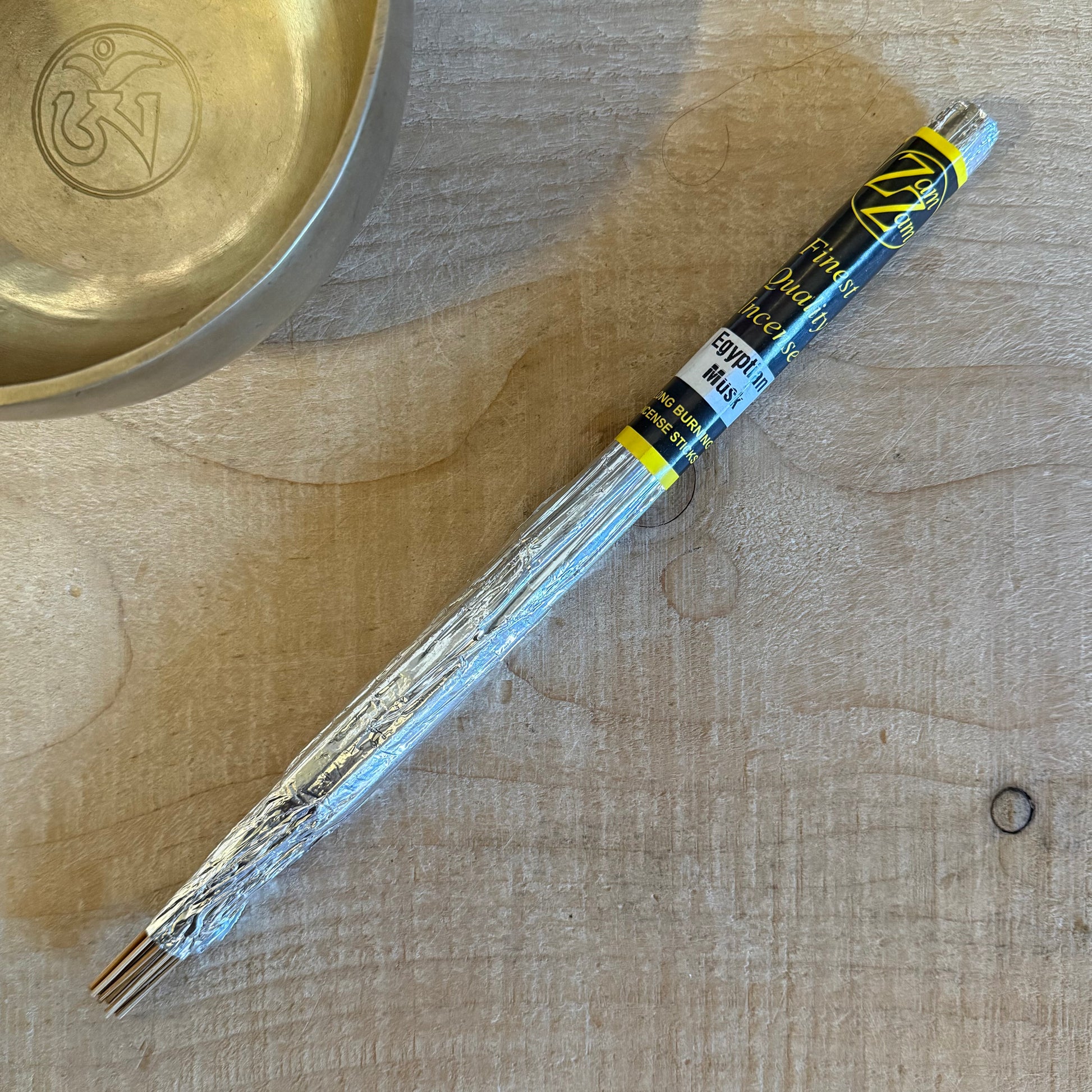 Zam Zam Egyptian Musk Incense Sticks are hand rolled using the finest natural ingredients to create a smooth, sensual, and deeply atmospheric fragrance. Crafted on pure bamboo sticks, each one is coated in a traditional blend of cypress, tabu bark, and Chinese juniper, then infused with high quality essential and perfumed oils.