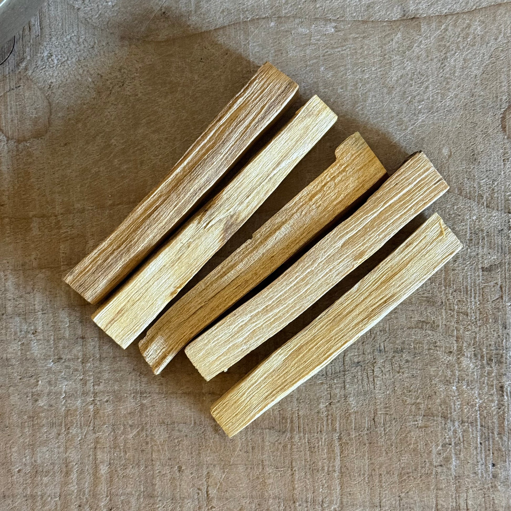Palo Santo holy wood incense for meditation and ritual
Green Tree Palo Santo thin sticks packaging and wood texture