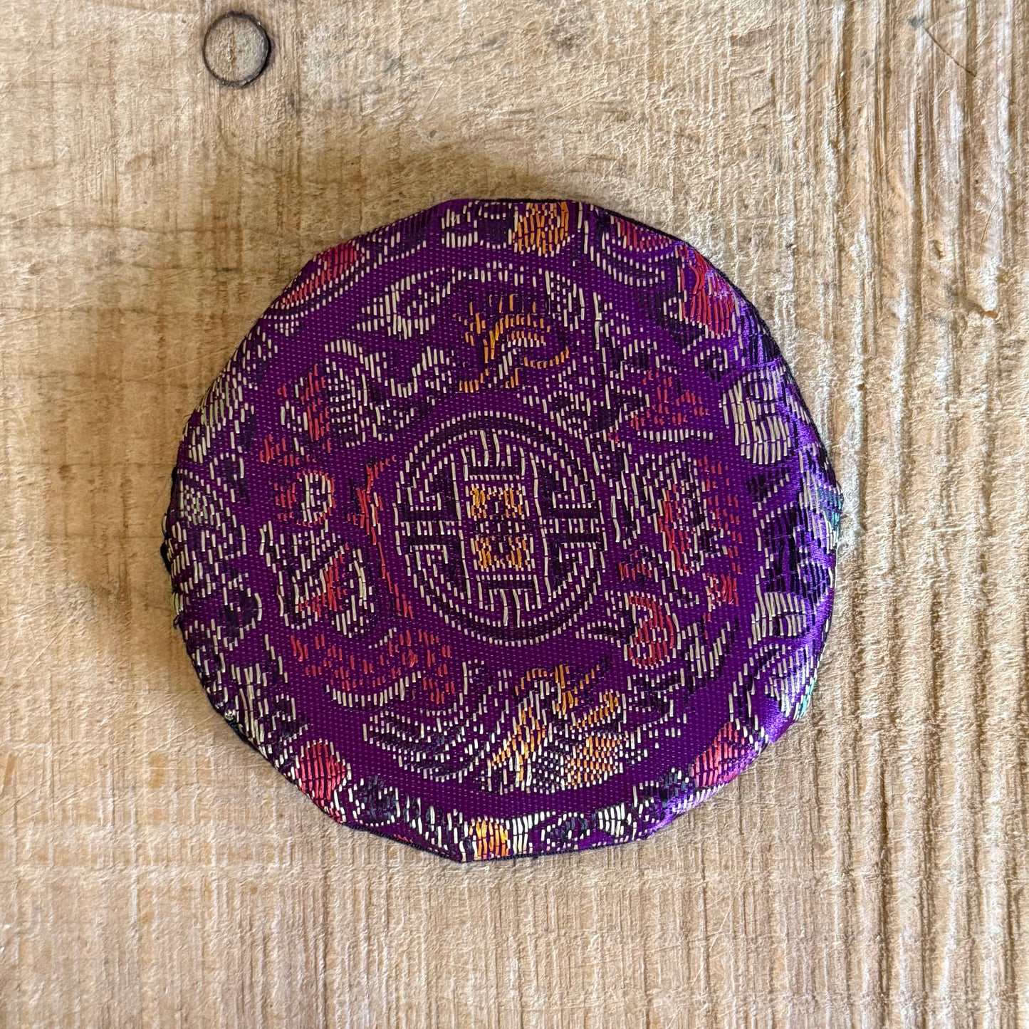 Brocade Singing Bowl Cushion – A Resting Place for Sacred Sound

Rooted in Buddhist tradition, this beautifully embroidered Small Brocade Singing Bowl Cushion offers a place of stillness for your singing bowl, allowing its vibrations to resonate with clarity and harmony.