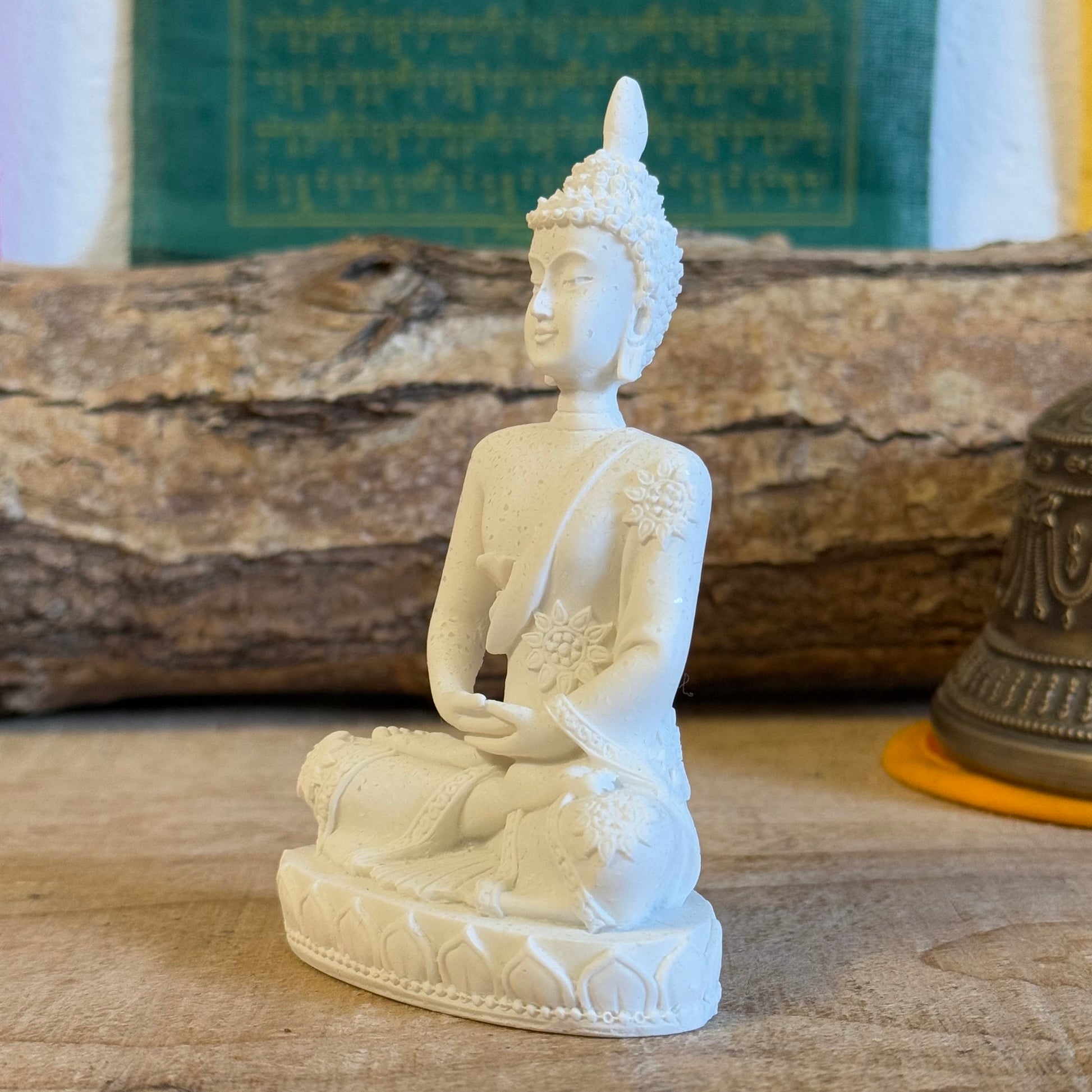 Discover our White Resin Buddha Statue in Dhyana Mudra, embodying meditation and spiritual perfection. Handcrafted with poly resin, this 11x6 cm statue symbolizes enlightenment and the unity of mind and world. Ideal for meditation spaces, altars, or mindful decor."