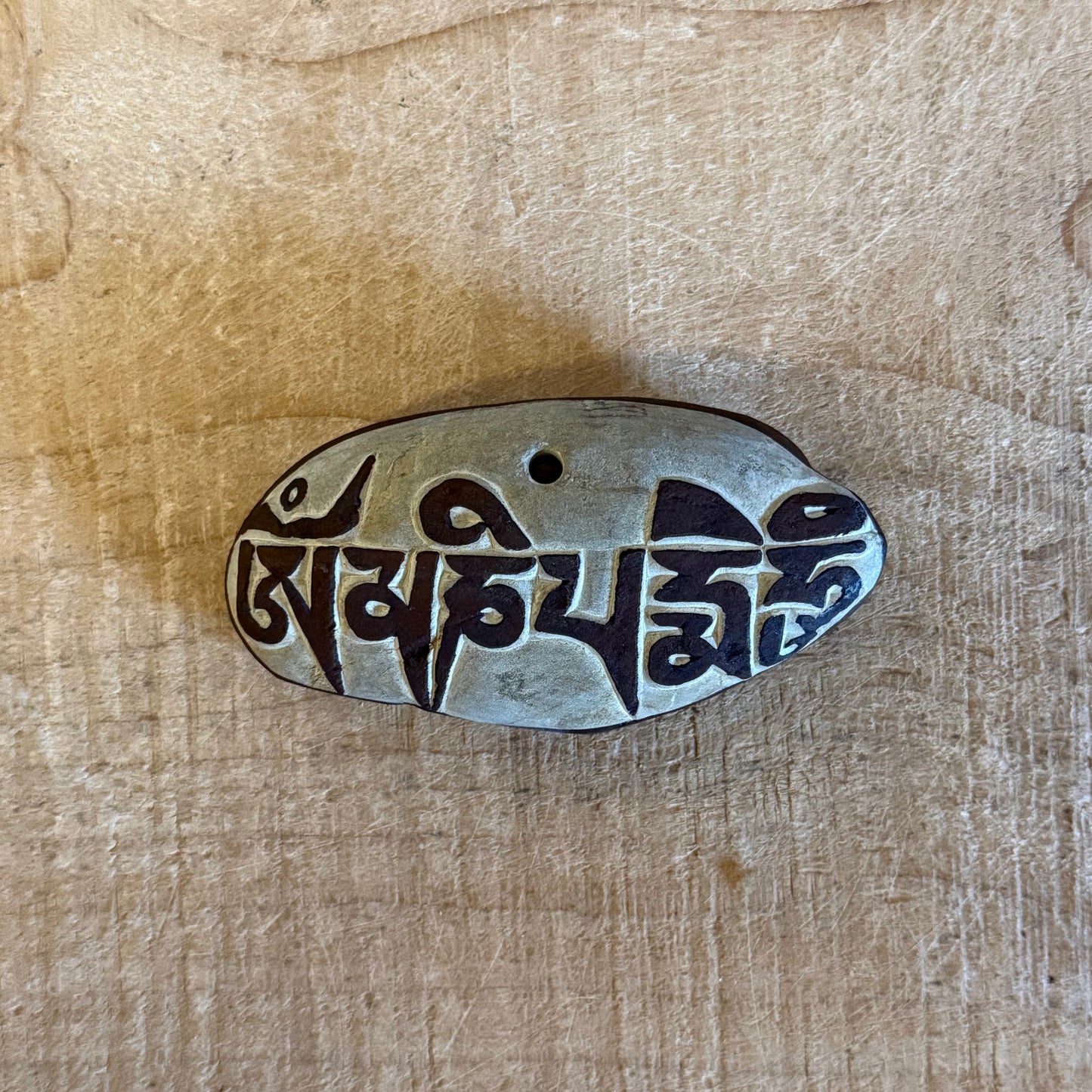 Hand-decorated Himalayan Om stone incense holder for meditation and ritual