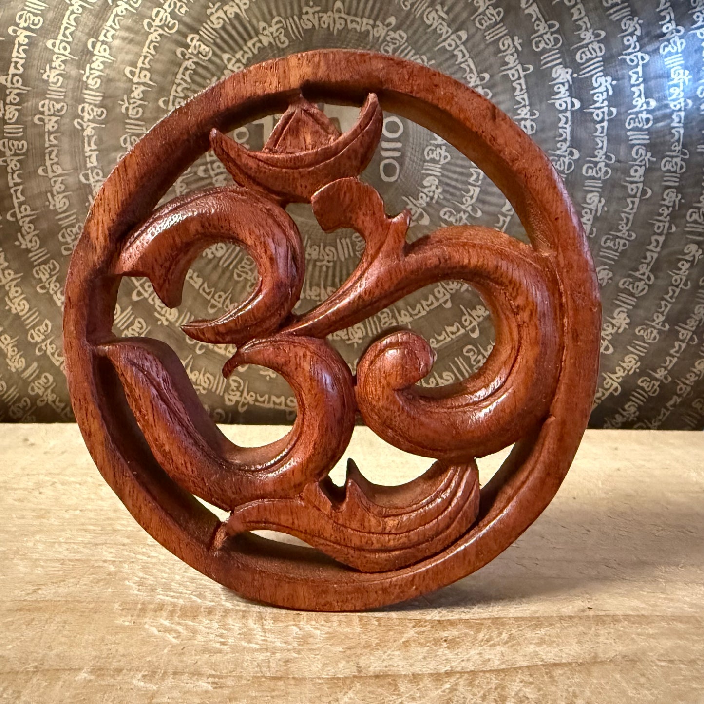 Bring harmony to your space with a Hand Carved Wooden Om Wall Hanging. Made from suar wood, symbol of peace and spiritual awakening.