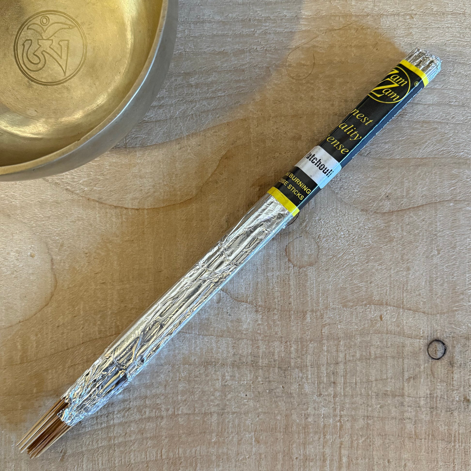 Zam Zam Patchouli incense sticks with rich earthy aroma. Long burning hand rolled incense for meditation, rituals, and grounding spaces.