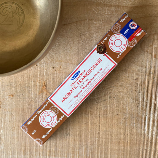 Experience the rich and distinctive fragrance of Satya Nag Champa Aromatic Frankincense Incense Sticks, blending the iconic Nag Champa aroma with warm, resinous frankincense notes. Perfect for creating a calming and atmospheric space, these incense sticks are ideal for meditation, yoga, relaxation, spiritual practice or simply enjoying a beautiful fragrance around the home. Each box contains 15g of incense with approximately 12 incense sticks, offering a long-lasting aromatic experience with every burn. Sat