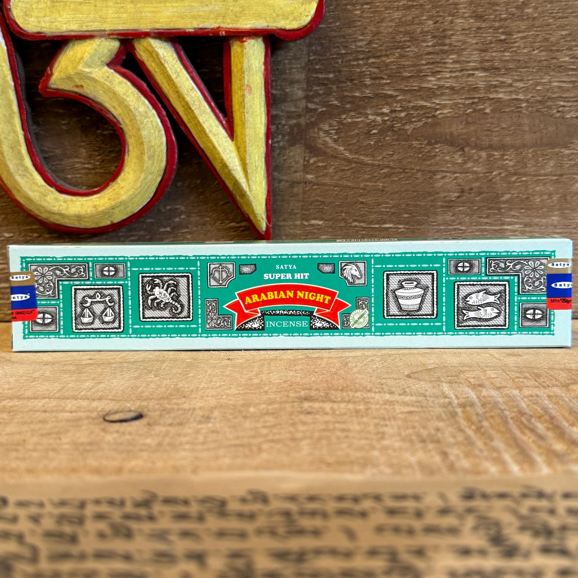 In the stillness of the evening, let the fragrance of Satya Super Hit Arabian Night Incense guide you toward peace. Crafted by the revered Shrinivas Sugandhalaya factory, this incense belongs to the world-famous Nag Champa Collection, cherished in Buddhist temples and meditation spaces across the globe.

Its base of sacred sandalwood is enriched with delicate flower oils, hand-rolled into each 20cm stick with mindful care. Light a stick to purify the atmosphere, deepen meditation, or simply invite calm into