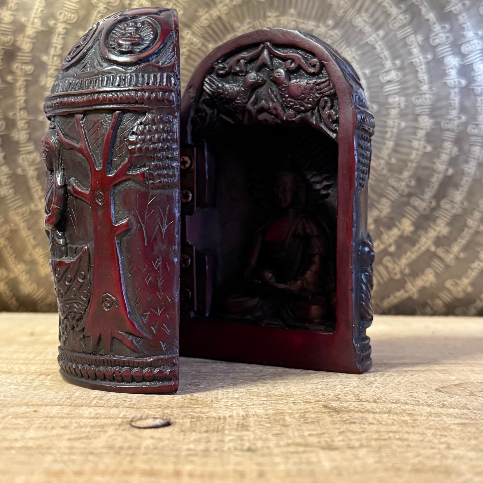 Handmade Buddhist folding altar Buddha Life Box. A Tibetan-style portable shrine depicting the life of the Buddha for meditation and ritual use.