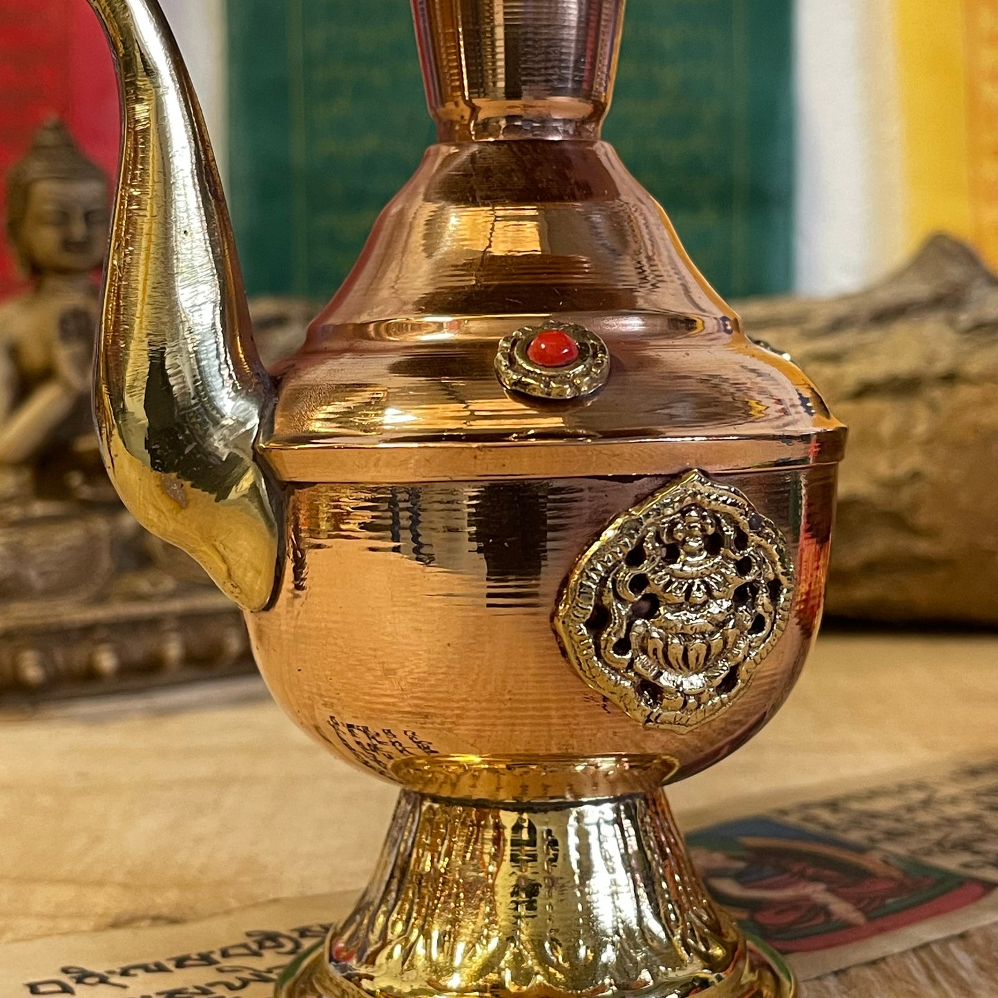 The Bhumpa, or Ritual Vase, is an important ceremonial item used for holding holy water that has been blessed by the Guru. The holy water is believed to remove negativity and to chase away evil spirits, and it is sprinkled or poured to purify persons, places or objects. Bhumpas are widely used by Gurus in many types of ceremonies, from elaborate purification rituals&nbsp;for new houses, monuments and holy sites, to simple blessings for disciples meant to purify and protect them from harmful&nbsp;forces. Bhu