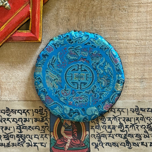 Brocade Singing Bowl Cushion | Handmade Support for Clear Sound

Enhance your practice with our brocade singing bowl cushion. Handmade in Nepal, it stabilizes your bowl for pure sound and adds beauty to your sacred space.