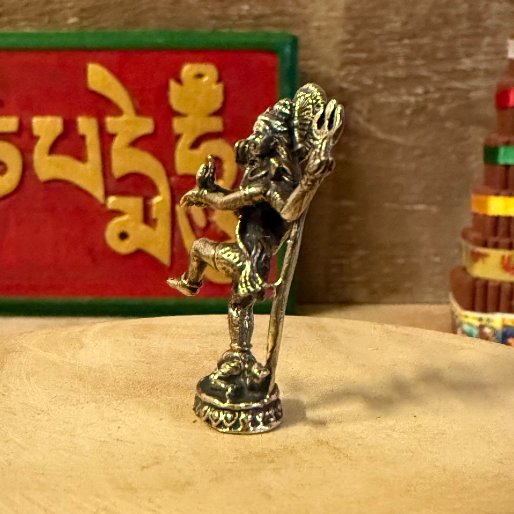 Celebrate the eternal rhythm of creation and renewal with the Mini Brass Dancing Shiva, a finely detailed brass sculpture depicting Lord Shiva in his sacred form as Nataraja, the Cosmic Dancer. Cast in radiant golden brass, this miniature statue captures Shiva’s graceful movement within the circle of flames—a symbol of the universe’s perpetual cycles of birth, preservation, and dissolution.