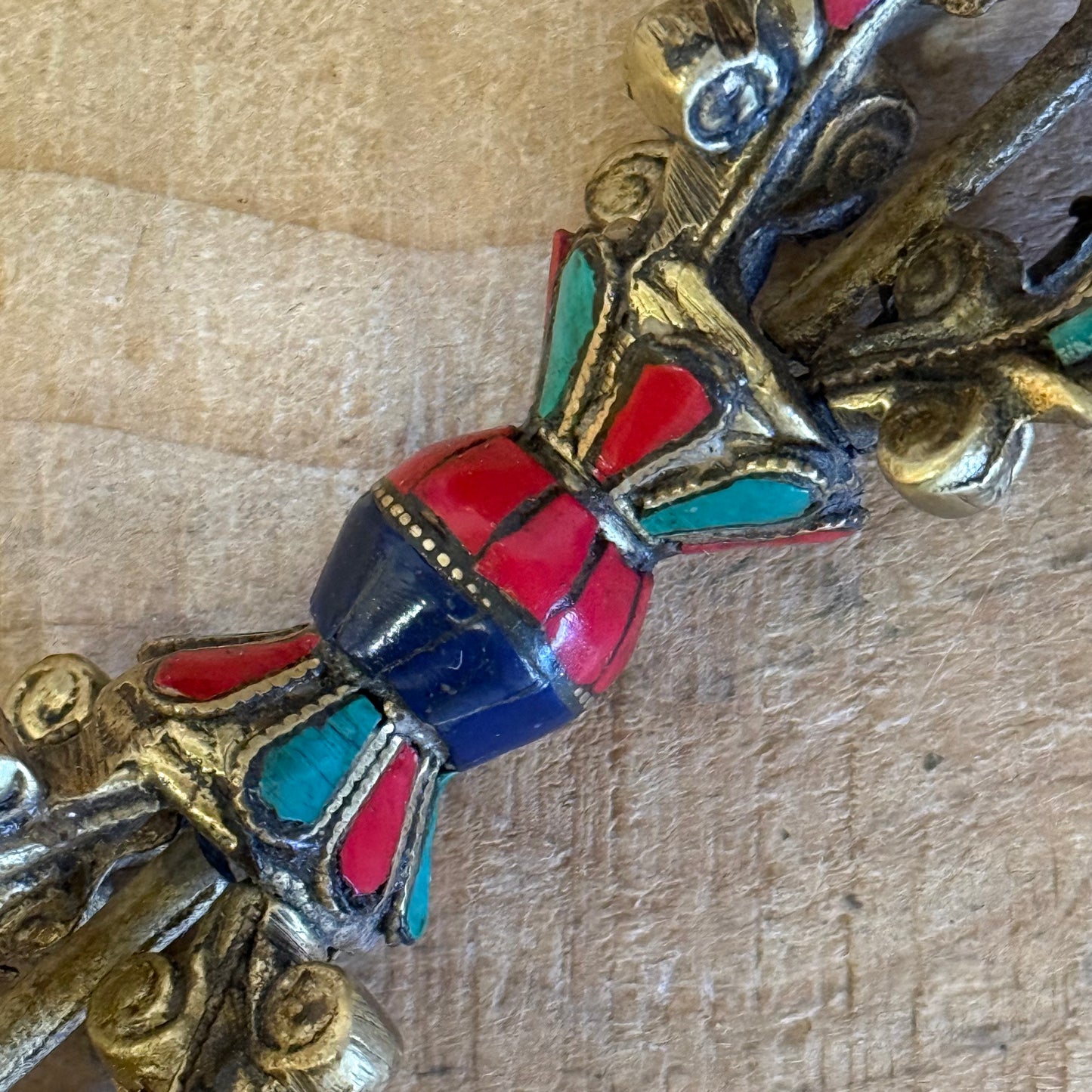 Handmade Flower Dorje ritual vajra in solid brass with turquoise inlay. Sacred Tibetan Buddhist altar object for meditation and ritual practice.