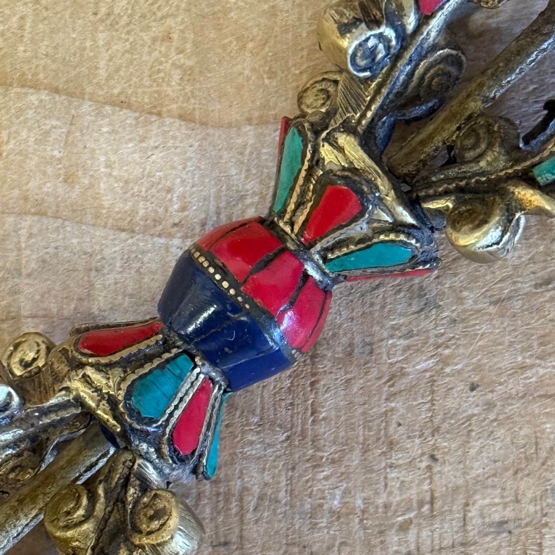 Handmade Flower Dorje ritual vajra in solid brass with turquoise inlay. Sacred Tibetan Buddhist altar object for meditation and ritual practice.