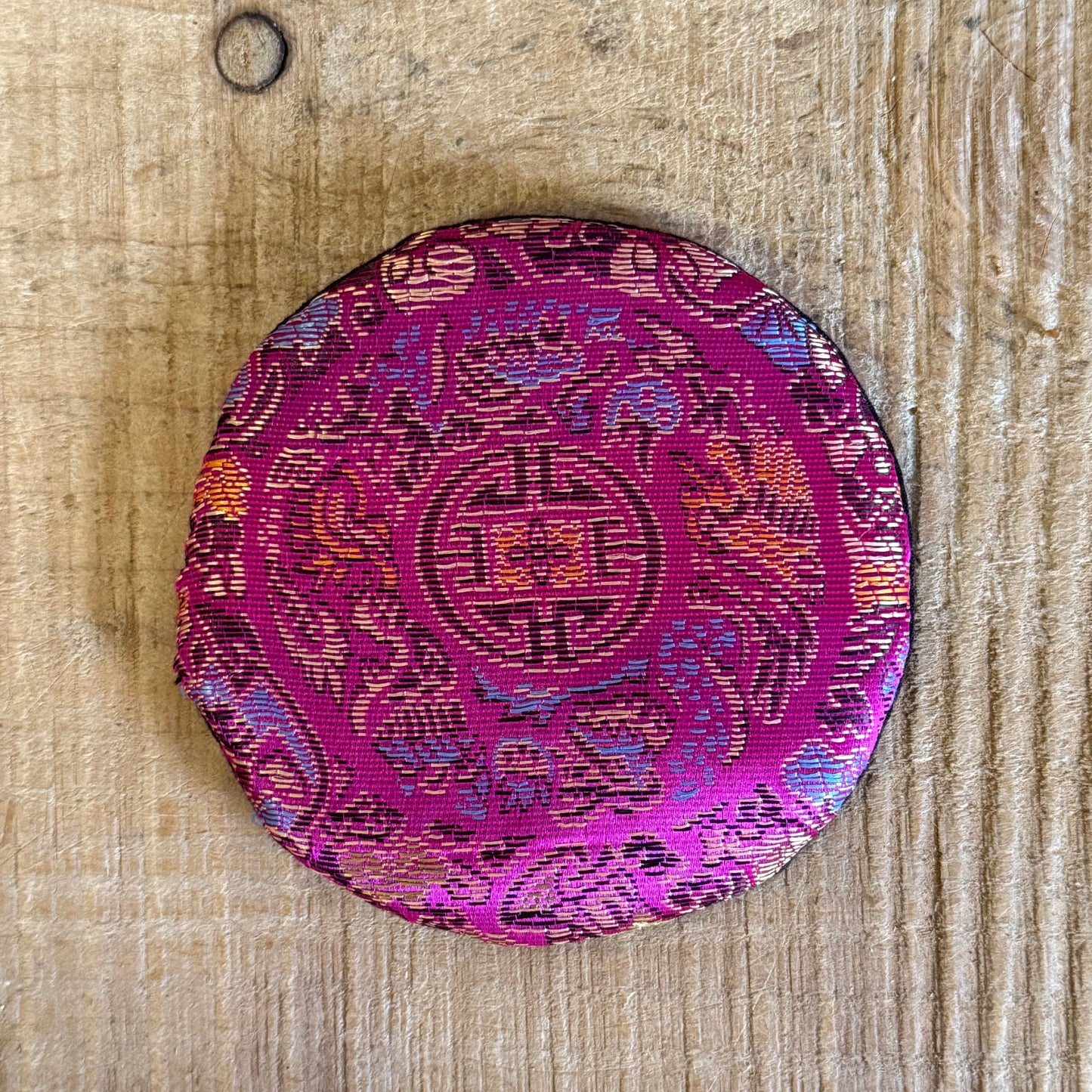 Brocade Singing Bowl Cushion – A Resting Place for Sacred Sound

Rooted in Buddhist tradition, this beautifully embroidered Small Brocade Singing Bowl Cushion offers a place of stillness for your singing bowl, allowing its vibrations to resonate with clarity and harmony.