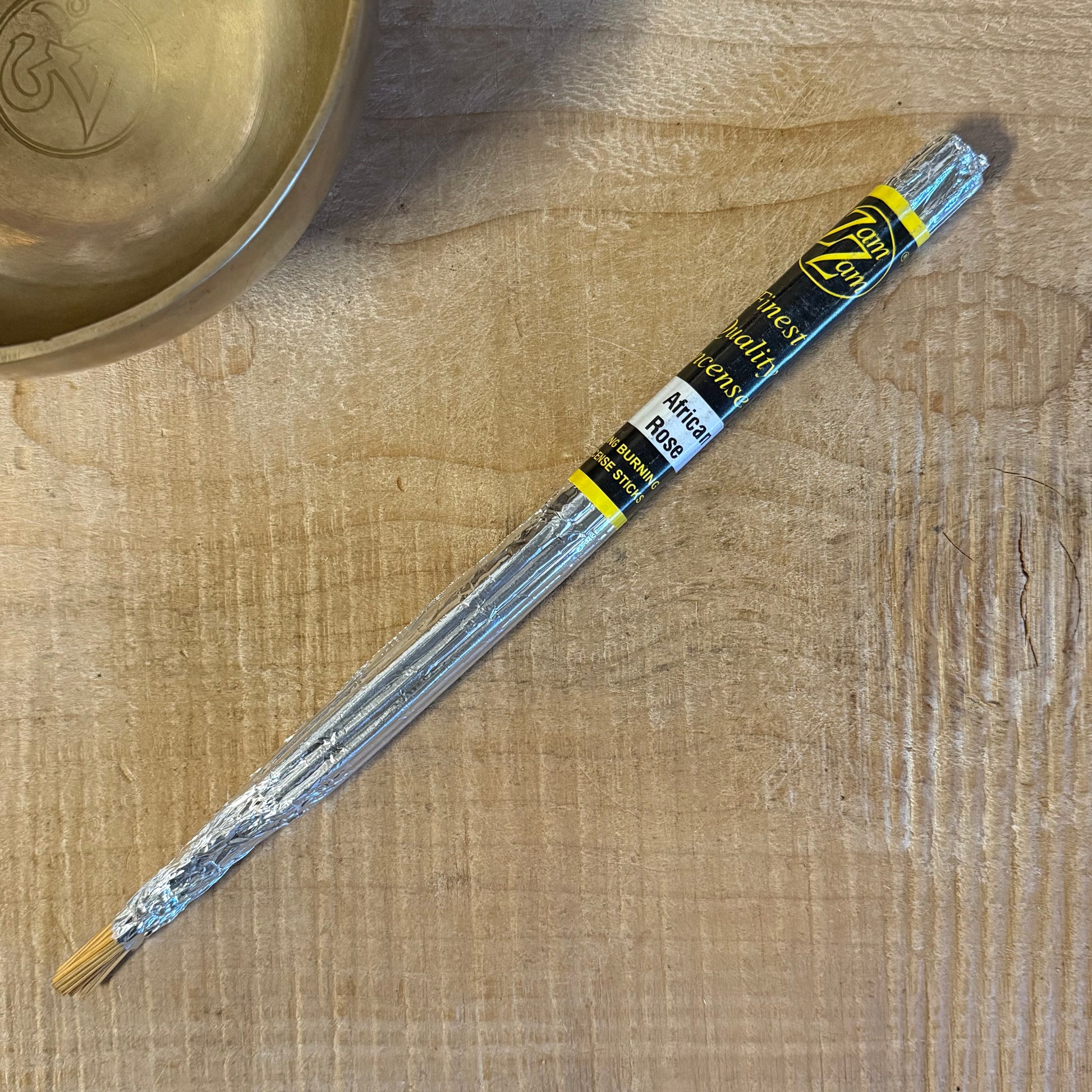 Zam Zam African Rose incense sticks with rich floral aroma. Hand rolled, foil wrapped, long burning incense made with natural oils and bamboo.