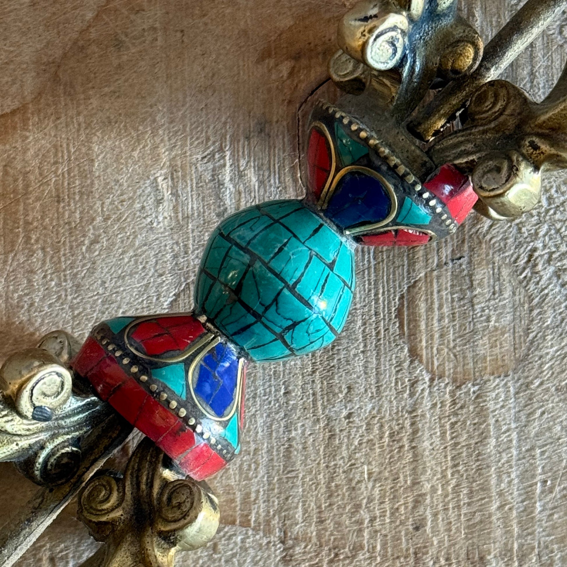 Handmade Flower Dorje vajra in solid brass with turquoise inlay. A sacred Tibetan Buddhist ritual object for altars, shrines, and Vajrayana practice.