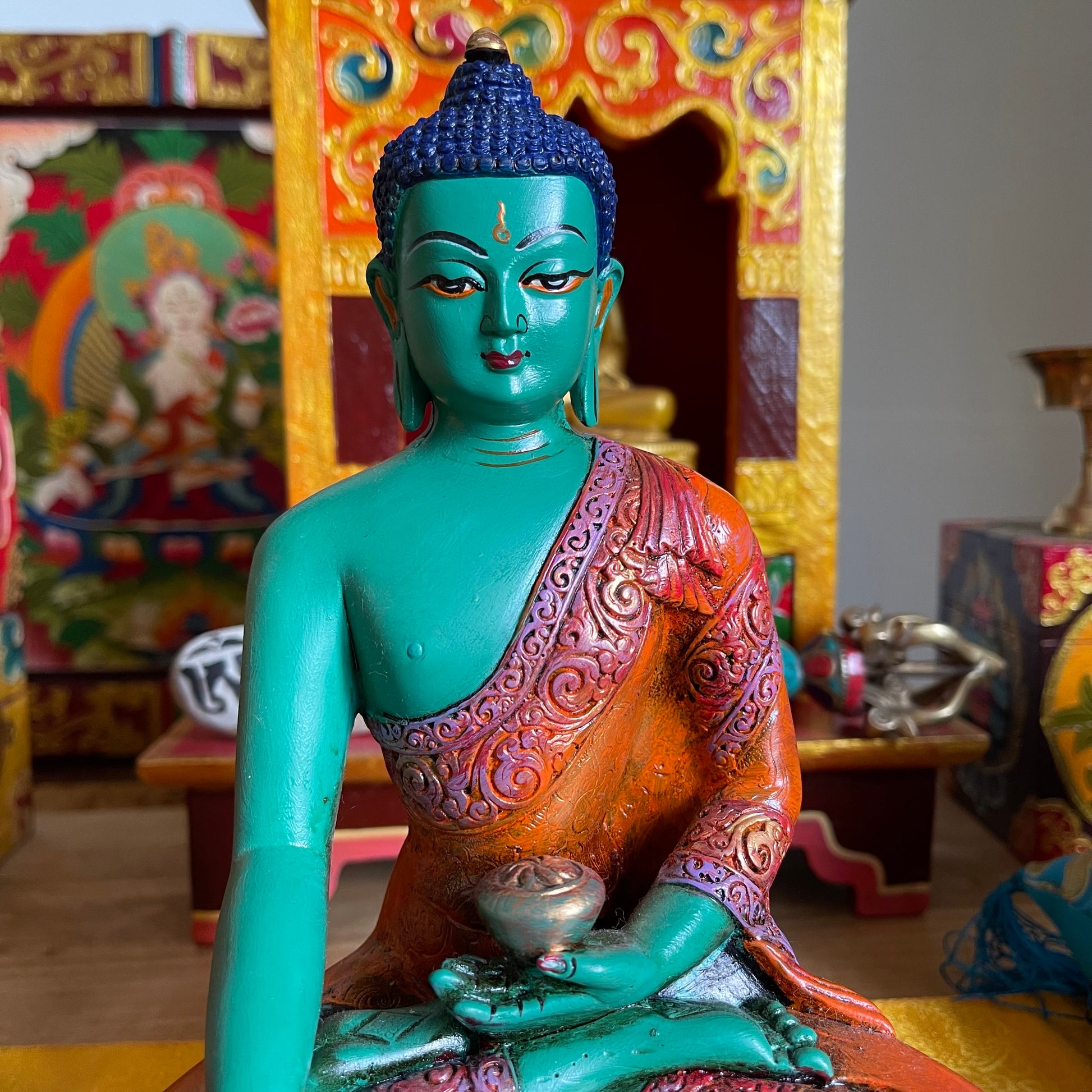 Resin Statue of Shakyamuni Buddha 22cm (Red Base)