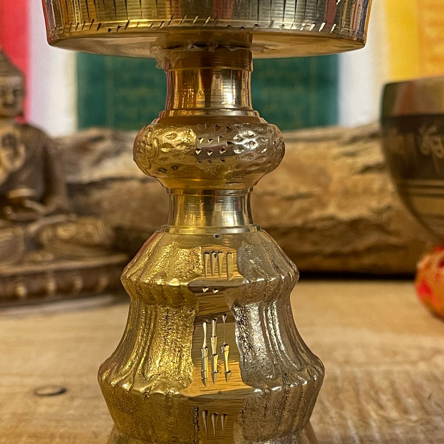 A traditional Tibetan Buddhist Butter lamp made from Brass.

Butter lamps are to be found in all Tibetan Buddhist temples and monasteries throughout the Himalayas. The lamps traditionally burn clarified yak butter, but now often use vegetable oil or vegetable ghee. Each morning Tibetan Buddhists offer butter lamps to represent the illumination of wisdom.