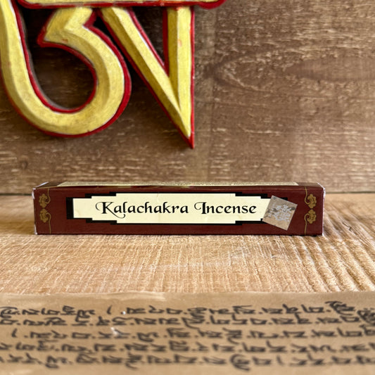 Breathe deeply and awaken the present moment with our Tibetan Kalachakra Incense, a sacred offering handcrafted in the Himalayan lands of Nepal. Rooted in ancient Tibetan tradition, this incense invites calm, clarity, and spiritual connection into your daily practice.

Each stick carries the energy of the Kalachakra – the Wheel of Time – a revered symbol in Vajrayana Buddhism representing inner and outer harmony. Blended with natural medicinal herbs and spices, the aroma is earthy and grounding, creating an