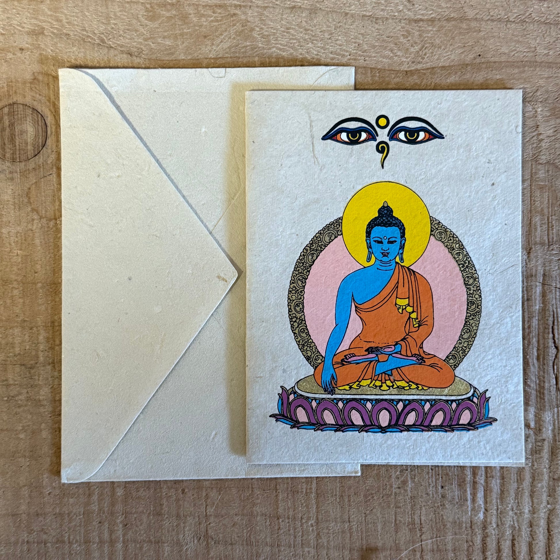 Handmade Medicine Buddha Lokta Paper Greeting Card featuring traditional Buddhist healing artwork.