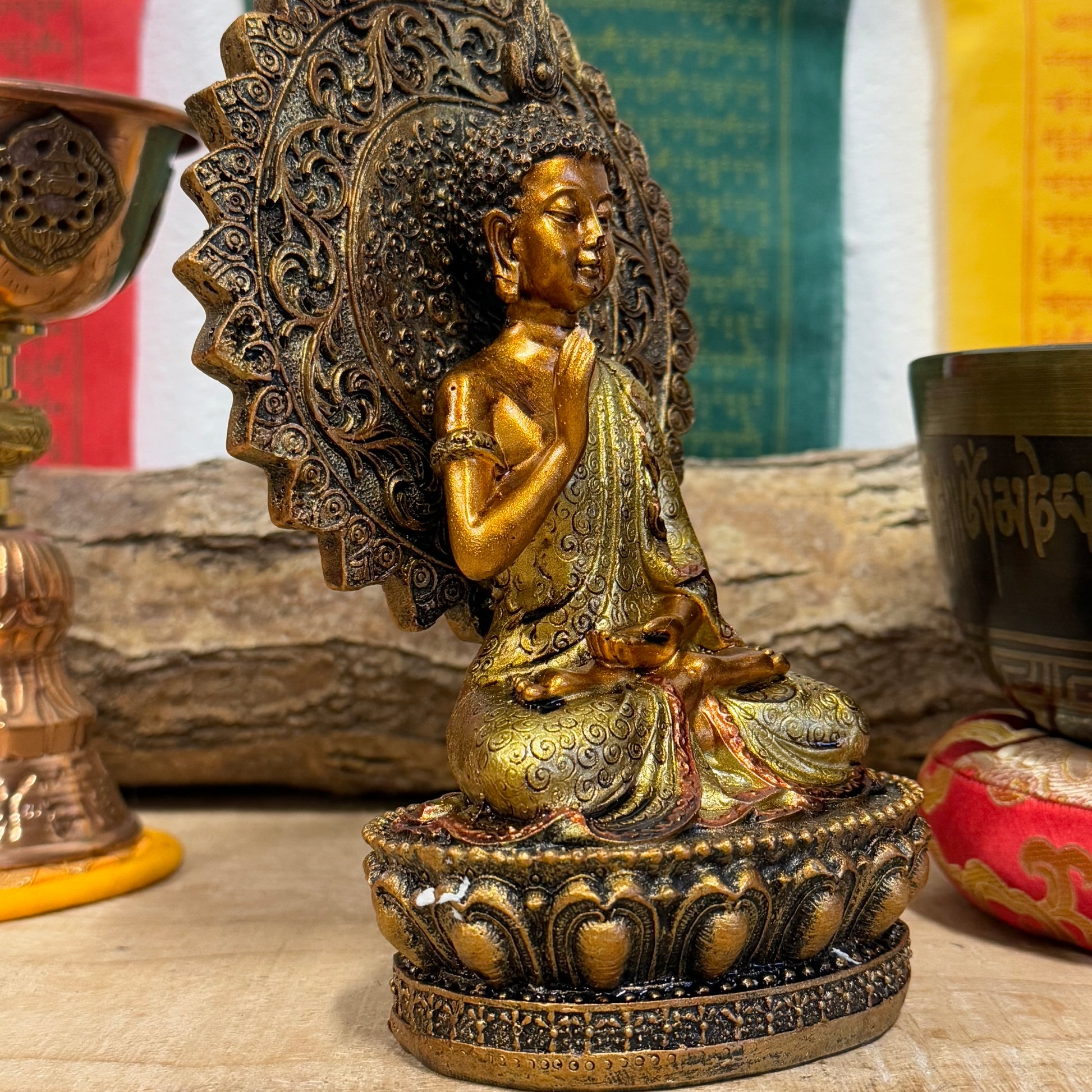 Buddha of Reassurance with Abhaya Mudra – 8cm x 18.5cm

Invite peace and protection into your home with this beautifully detailed Buddha of Reassurance statue, featuring the sacred Abhaya Mudra. Standing at approximately 18.5cm tall and 8cm wide, this exquisite statue captures the Buddha in a gesture of safety, peace, and reassurance. The Abhaya Mudra, where the right hand is raised with the palm facing outward, symbolizes protection, dispelling fear, and offering comfort during times of uncertainty.