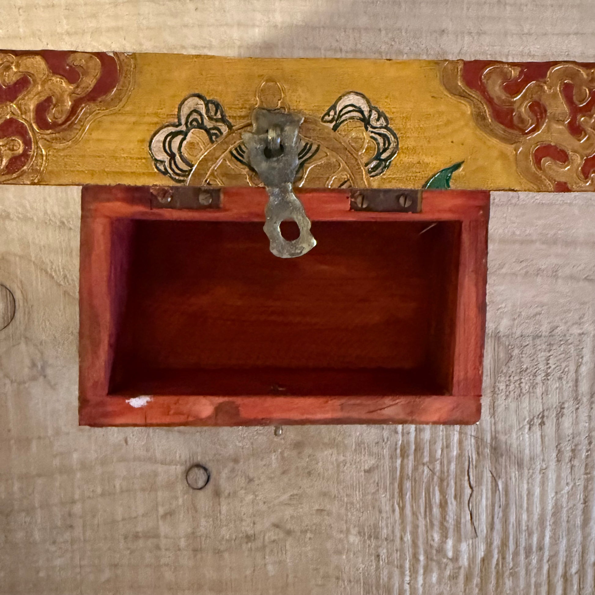 Hand-painted Tibetan square wooden box from Nepal, decorated with Buddhist symbols. Fairtrade, unique storage for jewellery or altar items.