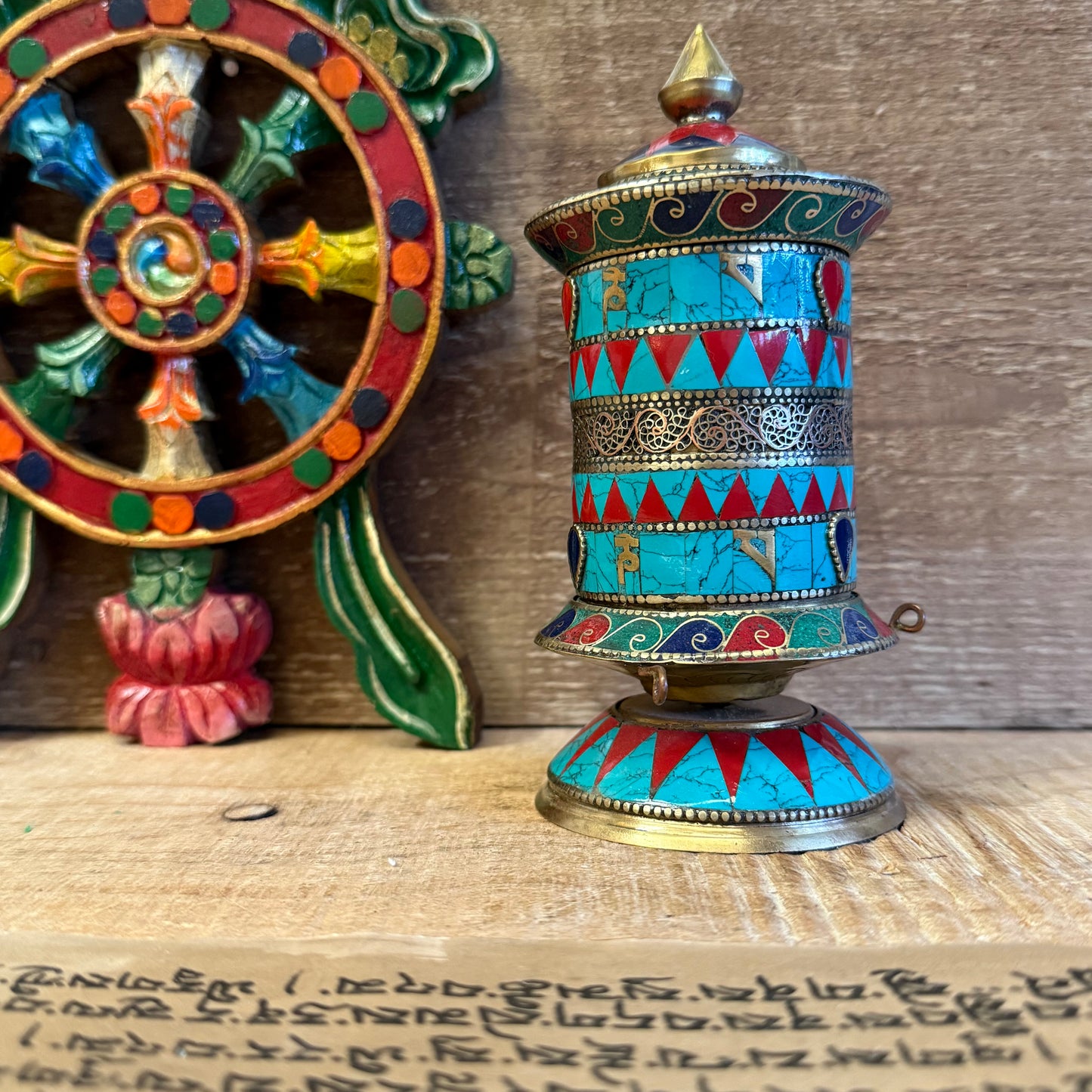 Prayer Wheel with Om Mantra Stone Chip | Copper & Brass 16cm

Handmade 16cm copper & brass prayer wheel with Om mantra scroll. Ideal for altar or desk. Each spin releases sacred blessings into the world.