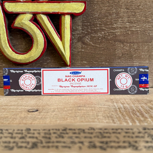 Satya Black Opium Incense is a rich and mysterious fragrance from the world-famous Nag Champa Collection, crafted by the Shrinivas Sugandhalaya family in India. Built upon a grounding base of sandalwood, this incense is infused with the deep, alluring notes of Black Opium—a scent that awakens the senses while calming the spirit.

Cherished in Buddhist temples and spiritual circles, Black Opium incense creates an atmosphere of focus and serenity, making it a perfect companion for meditation, ritual, or quiet