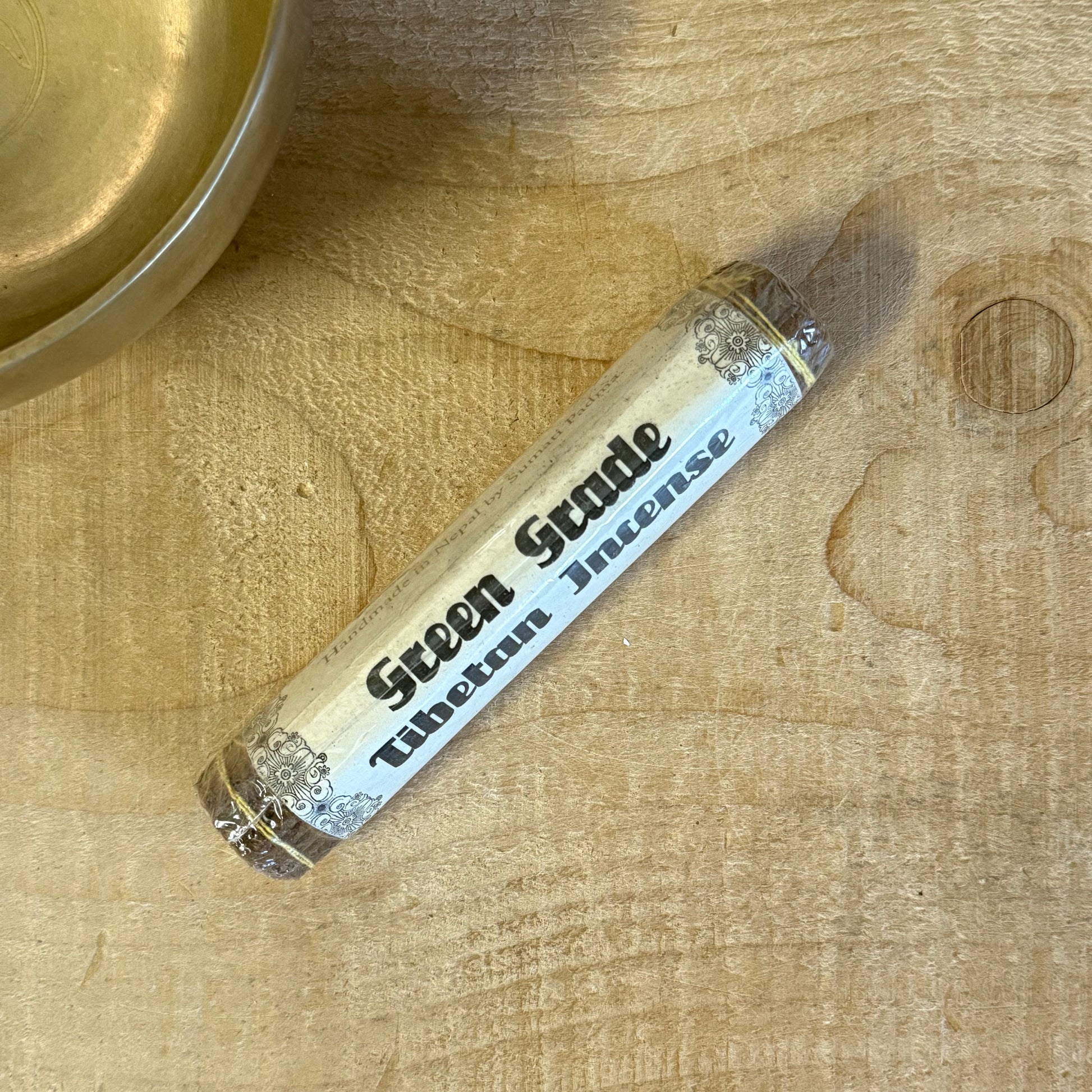 Green Grade Tibetan Incense sticks hand-rolled and wrapped in Lokta paper, handmade in Nepal.