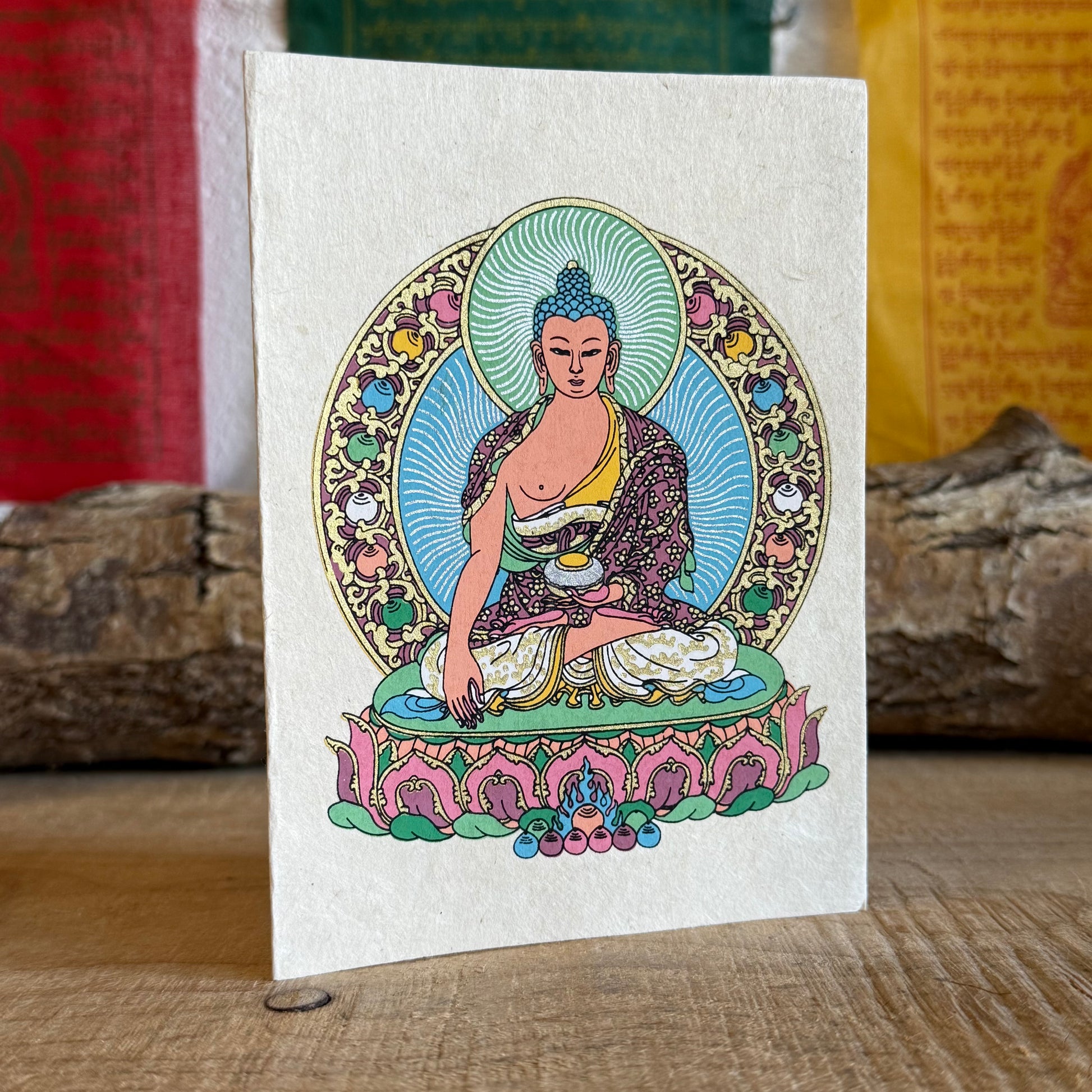 Beautifully coloured and decorated greetings card, made from Lokta paper. Lokta paper making is a traditional practice from the high altitude Himalayan forests of Nepal. The Lokta bush is a fast growing shrub and the paper making process helps to provide economic stability for some of Nepal's poorer rural people.

Buddhist design Lokta paper card with envelopes
Made from a sustainable plant source
Fair Trade from Nepal

Size: 15.5 x 11.5 cm