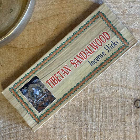 Our Tibetan Sandalwood Incense is handcrafted in the Himalayas using an ancient Tibetan formula of natural herbs, leaves, and rare high-altitude spices.

Sandalwood’s sweet, grounding aroma purifies the mind, deepens focus, and invites calm—perfect for daily meditation, prayer, or sacred ritual. Each stick is hand-rolled by Tibetan artisans, honouring a lineage of spiritual craftsmanship.

Approx.: 40 sticks
Origin: Nepal
100% natural ingredients