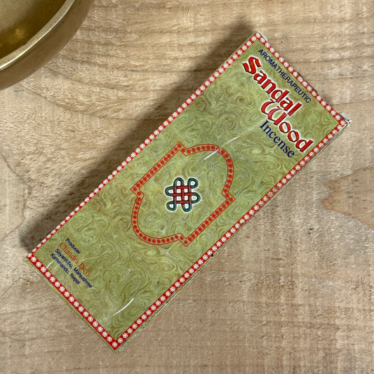Chandra Devi Sandalwood Incense is crafted from sacred Himalayan herbs using an ancient formula. Its naturally sweet, calming aroma supports meditation, purification, and inner peace. Each 15 cm stick is hand-rolled from organic ingredients, offering a tranquil, grounding burn ideal for rituals, yoga, or daily spiritual practice. Contains 30 sticks, 70g.&nbsp;