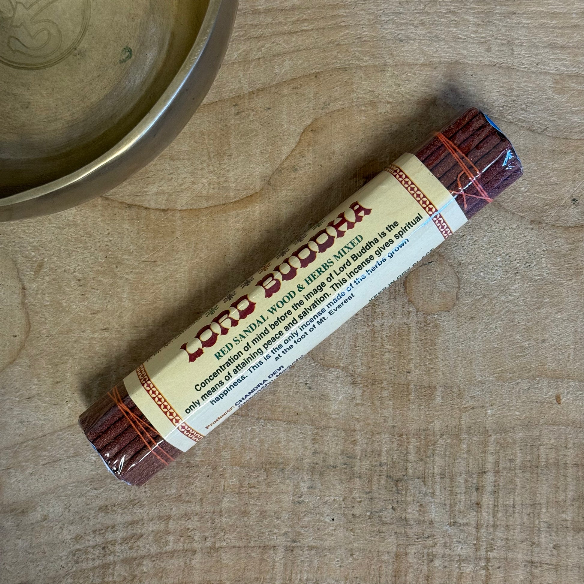 Beloved one, welcome the sacred scent of inner peace. The Chandra Devi Lord Buddha Tibetan Incense is a humble offering crafted in the ancient tradition of the Himalayas. It combines soft, sacred sandalwood with rare Himalayan herbs, gathered respectfully from the mountain slopes where the air is still and pure.