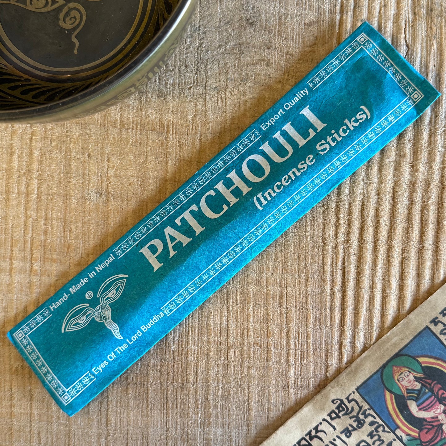 Discover Serenity with Our Handcrafted Patchouli Incense Sticks

Immerse yourself in the calming essence of our handmade Patchouli Incense Sticks. Famed for its sensually sweet and darkly floral fragrance, patchouli has been cherished for centuries as a centerpiece in perfumes and incense.

Each set is lovingly crafted in Nepal using 100% natural ingredients, ensuring a pure and tranquil experience. Packaged in a beautifully handmade lokta paper packet adorned with the iconic Wisdom Eyes of Buddha, this pro