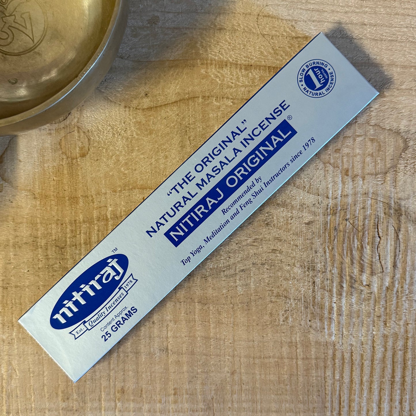 Nitiraj Original Natural Masala Incense is crafted with pure, slow-burning ingredients for a deep, soul-embracing aroma. Favoured for meditation for over 40 years, each stick burns for around one hour, supporting yoga, feng shui, relaxation, and spiritual clarity. Available in 12g, 25g, and 100g packs.