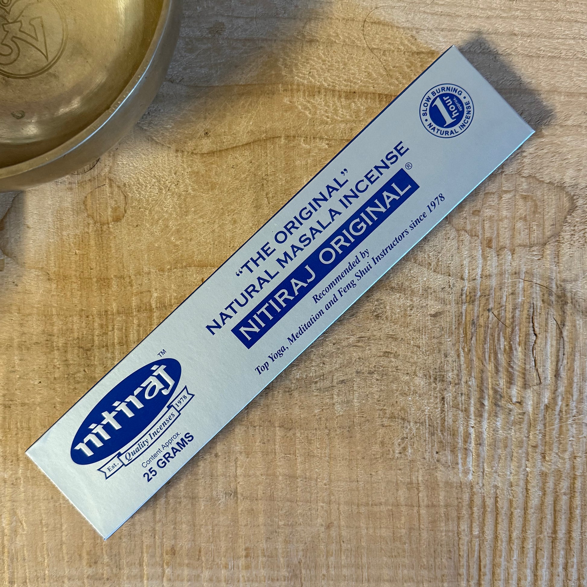 Nitiraj Original Natural Masala Incense is crafted with pure, slow-burning ingredients for a deep, soul-embracing aroma. Favoured for meditation for over 40 years, each stick burns for around one hour, supporting yoga, feng shui, relaxation, and spiritual clarity. Available in 12g, 25g, and 100g packs.