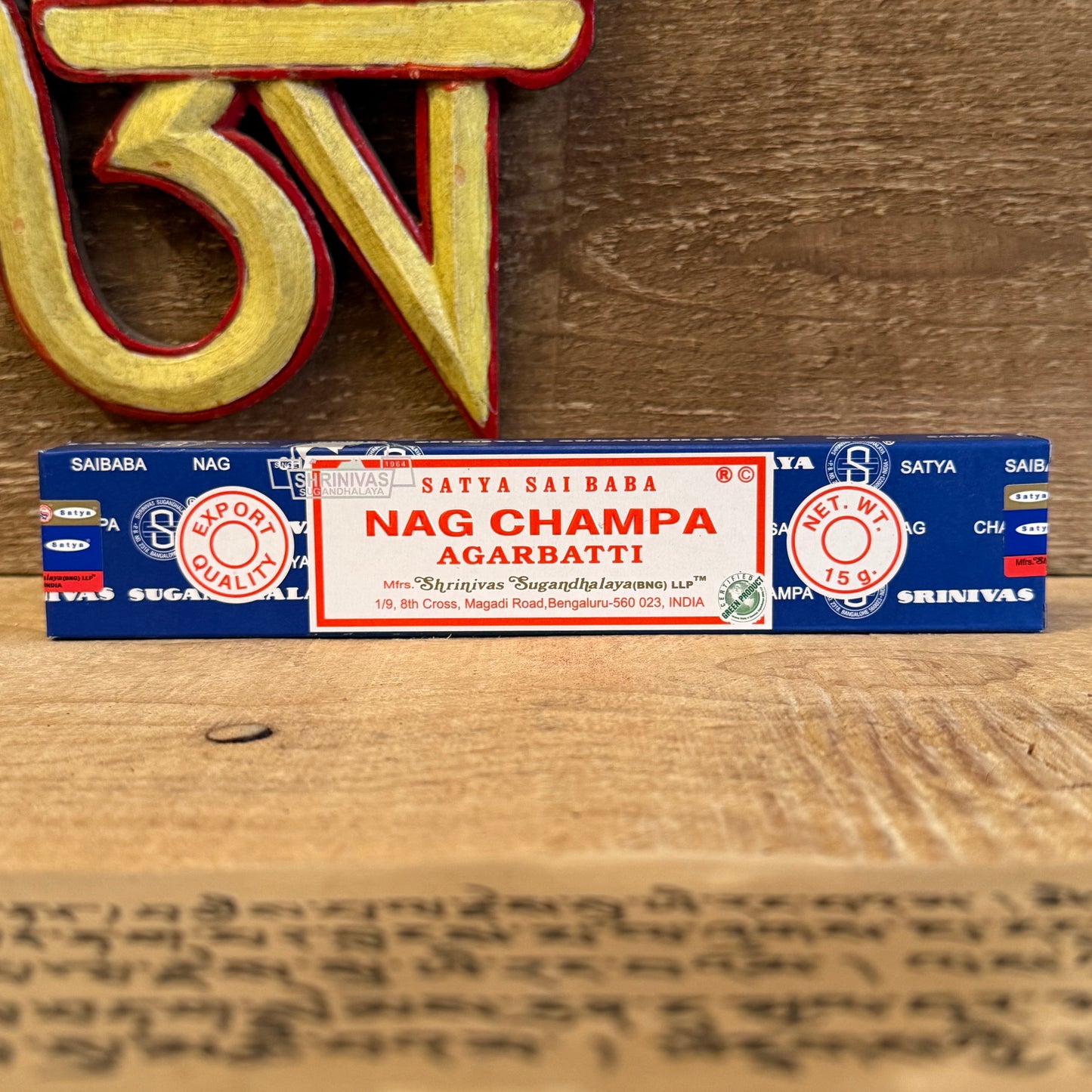 Satya Nag Champa Incense is one of the most revered and widely used incense blends in the world, hand-rolled in India at the Shrinivas Sugandhalaya factory. Crafted with devotion, it begins with a grounding base of pure sandalwood, into which fragrant floral oils are carefully blended—most notably the sacred Champa flower.

Beloved in Buddhist temples and home altars alike, this incense serves as a spiritual companion in meditation, prayer, or ritual cleansing. Its rich, calming aroma purifies the space and