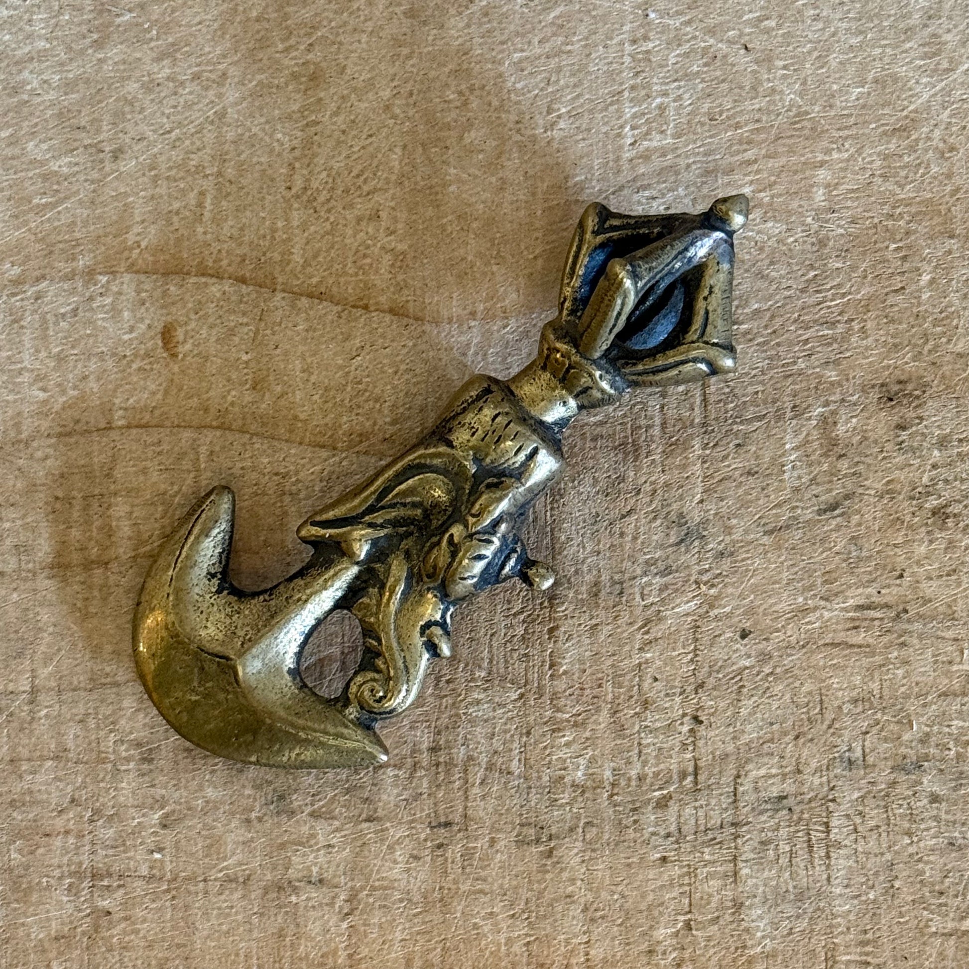 Fine metal Kartika drigug ritual knife from Nepal, used in Tibetan Buddhist and Vajrayana tantric altar practice to cut through ignorance and ego.