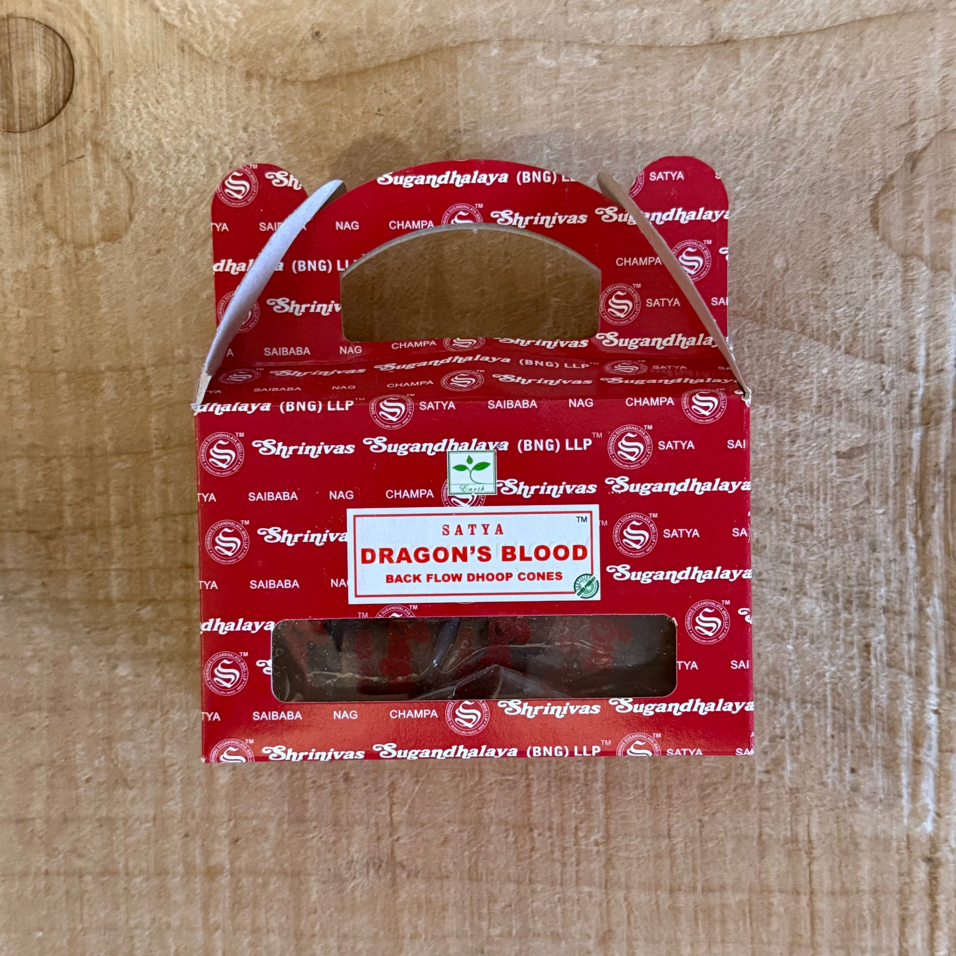 Satya Dragon’s Blood Backflow Incense Cones creating cascading smoke for meditation and ritual