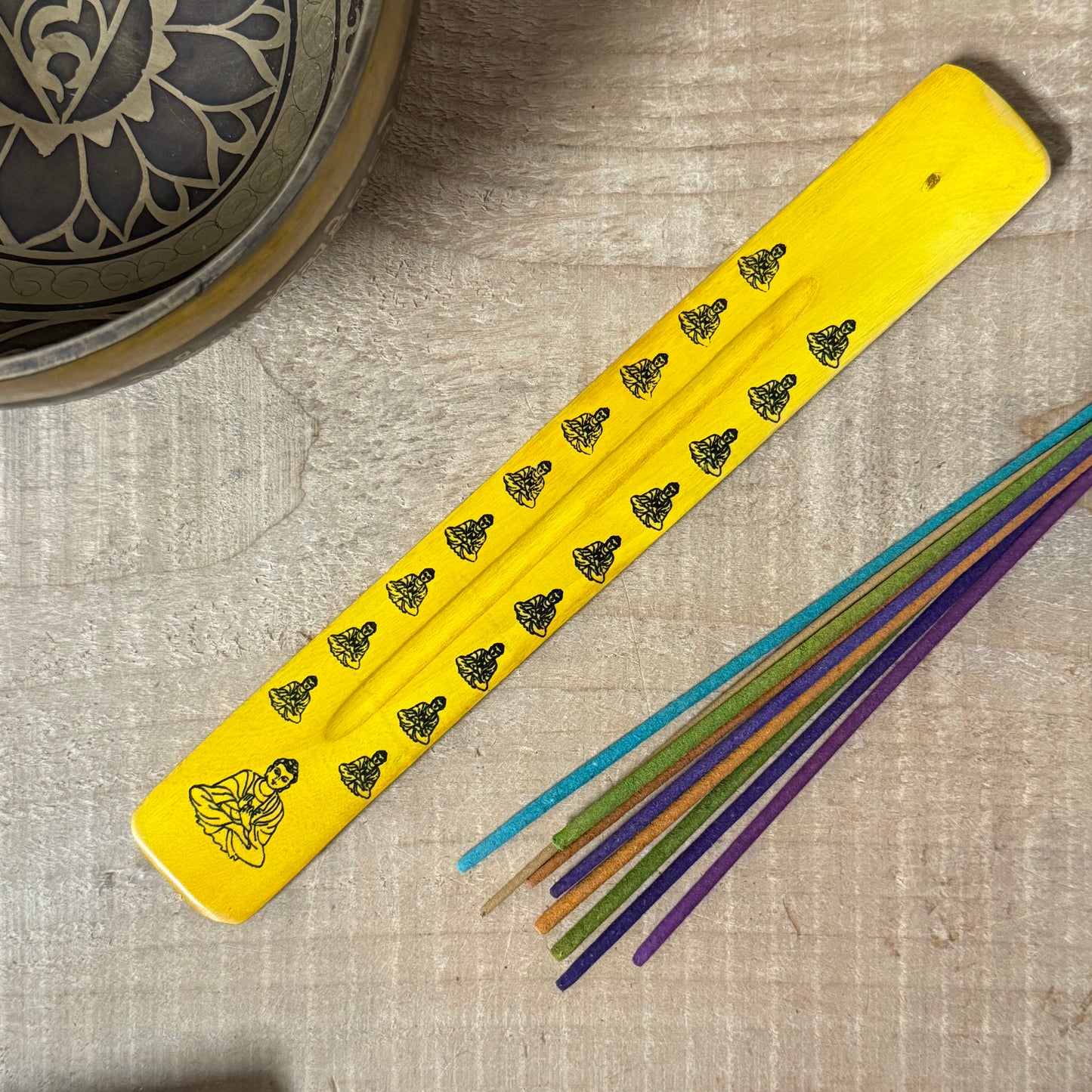 Handcrafted wooden incense holder with Om design for meditation, spiritual rituals, and mindful incense burning.