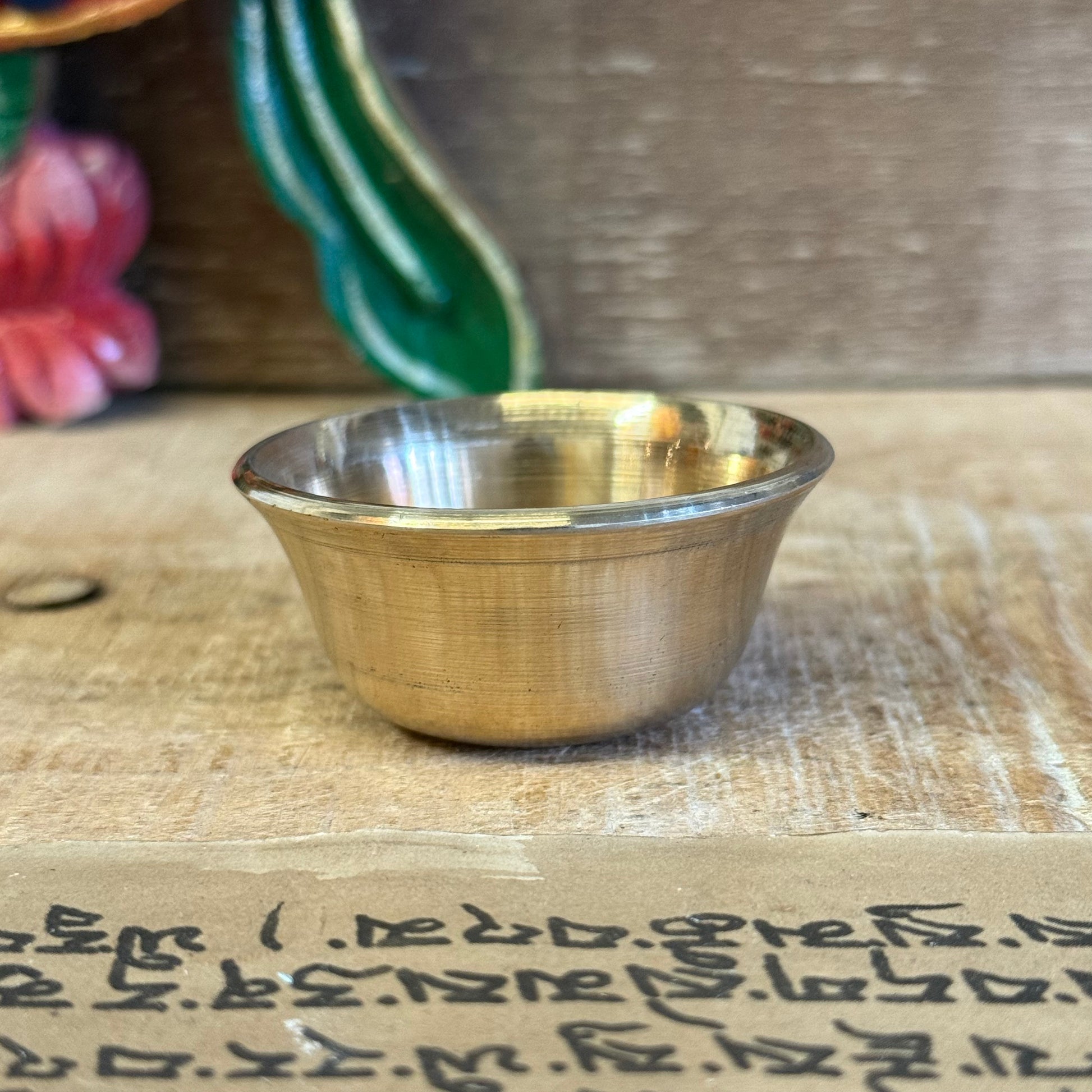 These Small Brass Offering Bowls are used in the sacred practice of making offerings to the Buddhas and Bodhisattvas. A complete set of seven symbolizes the perfection of generosity and is arranged on altars in temples, shrines, or home meditation spaces.

Traditionally, each bowl is filled with substances such as water, incense, perfumed oil, food, flowers, or light—expressing a pure heart and the wish to cultivate virtue. Laying out these offerings is a daily act of devotion, mindfulness, and humility.