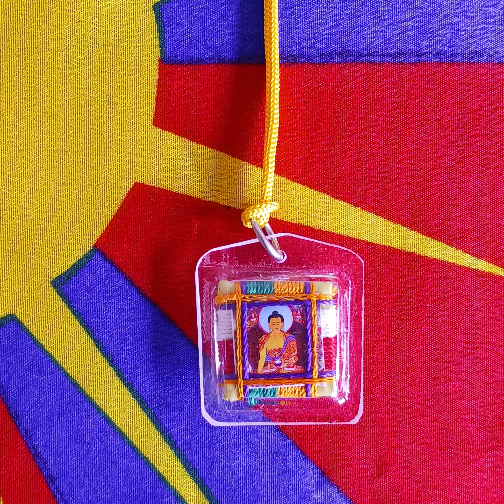 Invite peace, protection, and mindfulness into your life with this little Shakyamuni Buddha Tibetan Pendant. Skilfully crafted with traditional Tibetan design, this sacred pendant depicts Shakyamuni Buddha, the enlightened one, symbolizing serenity and spiritual guidance.