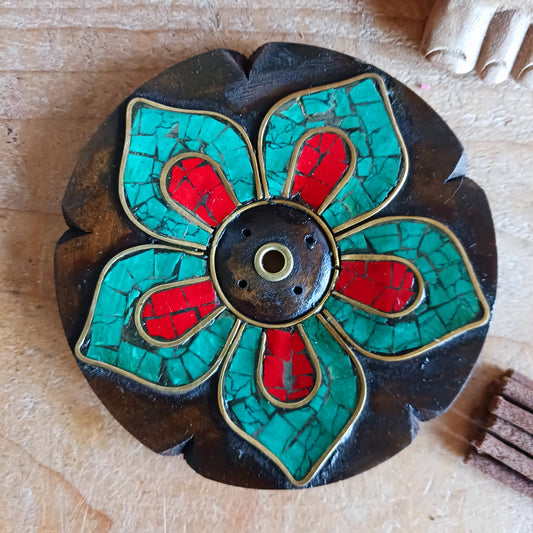 Elevate your incense rituals with these beautifully handcrafted wooden incense burners featuring intricate stone inlay designs. Each piece is made by skilled artisans, giving every burner a unique character—small imperfections are natural and celebrated as part of its handmade charm.